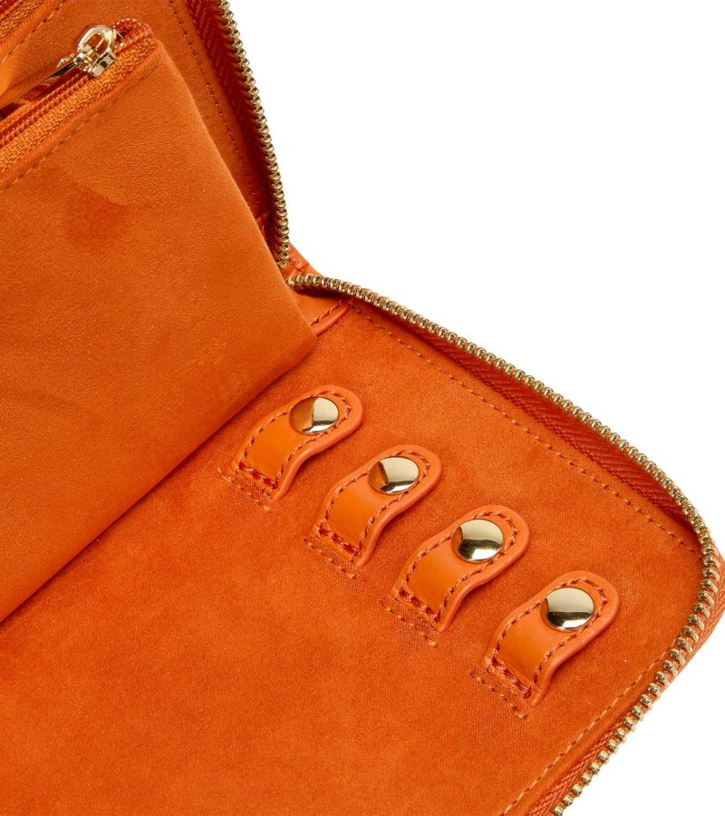 MARIA JEWELRY PORTFOLIO, Material: Leather
Storage: 1 earring tab, 1 ring tab, 2 zip compartments, 4 snap-on necklace hooks with pocket
LusterLoc™: Allows the fabric lining the inside of your jewellery cases to absorb the hostile gases known to cause tarnishing. Under typical storage conditions, it can prevent tarnishing for up to 35 years
8.75" L X 5.25" W X 1.25" H
, Gifts, WOLF DESIGNS, INC