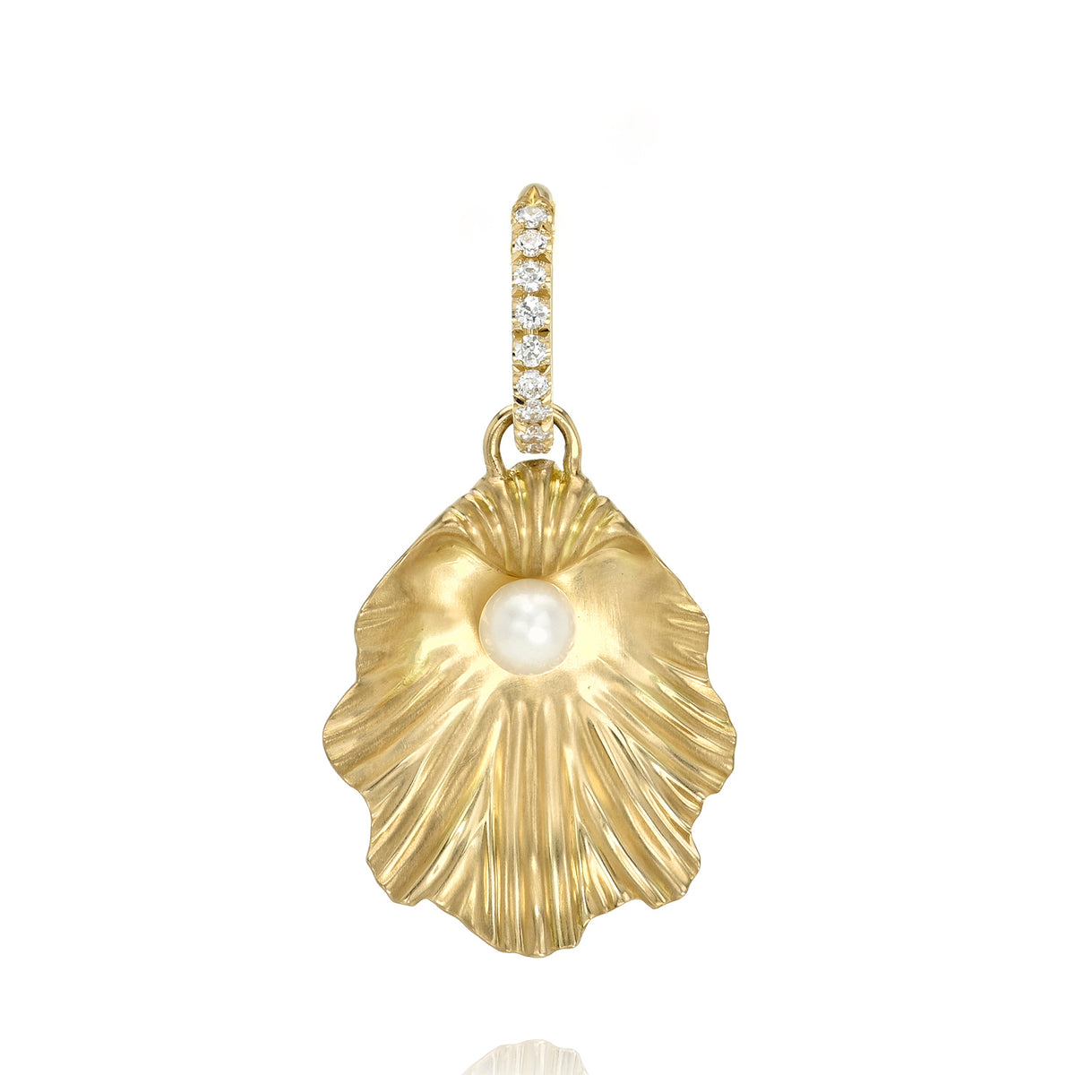 Gold shell pendant with a pearl and diamond accents on a white background