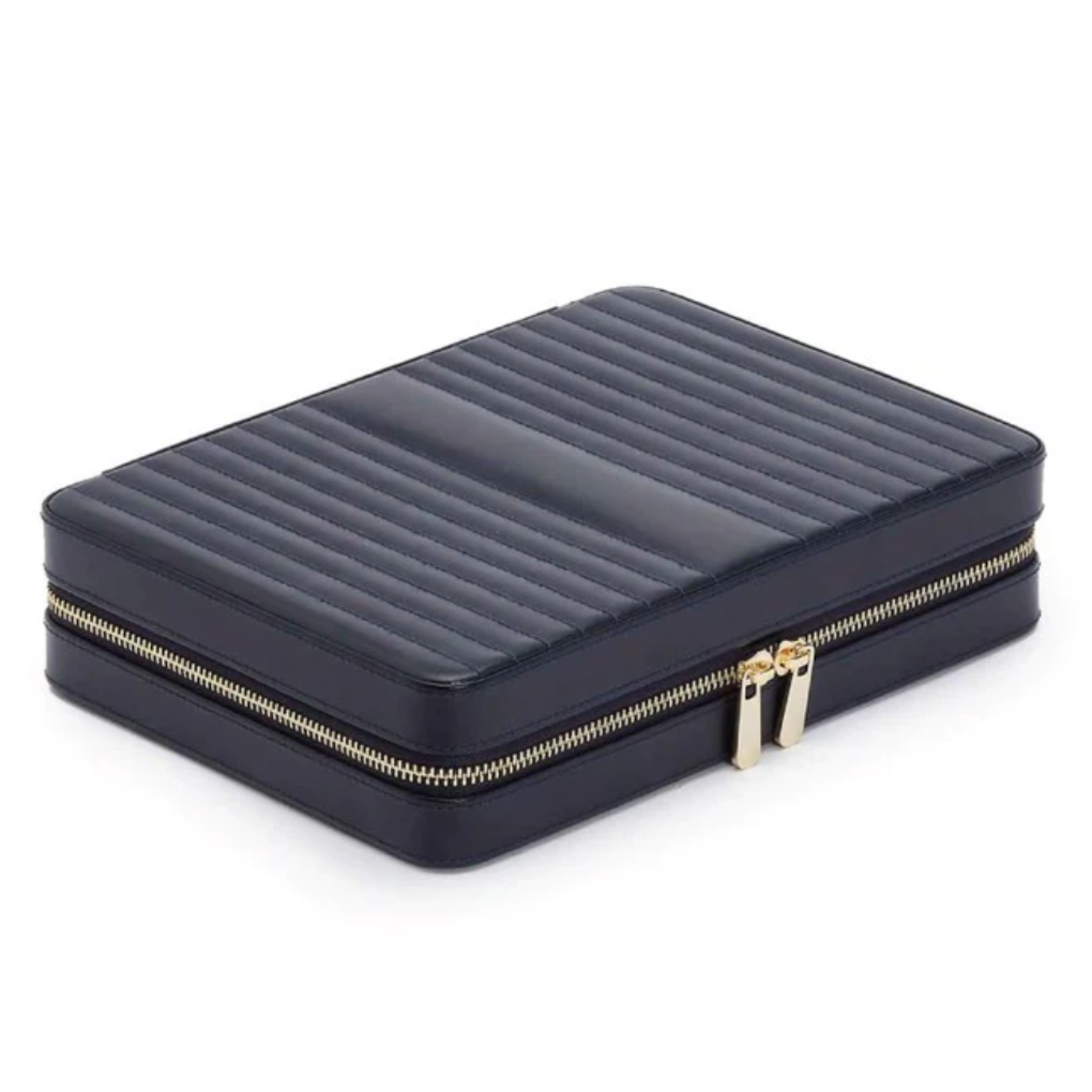 MARIA LARGE ZIP CASE, Material: Leather
Storage: 10 ring rolls, 2 open compartments, 1 lidded compartment, 2 drawstring pouches, 6 necklace snap-on hooks with pocket, 1 ring bar, one earring bar.
LusterLoc™: Allows the fabric lining the inside of your jewellery cases to absorb the hostile gases known to cause tarnishing. Under typical storage conditions, it can prevent tarnishing for up to 35 years
, Gifts, WOLF DESIGNS, INC