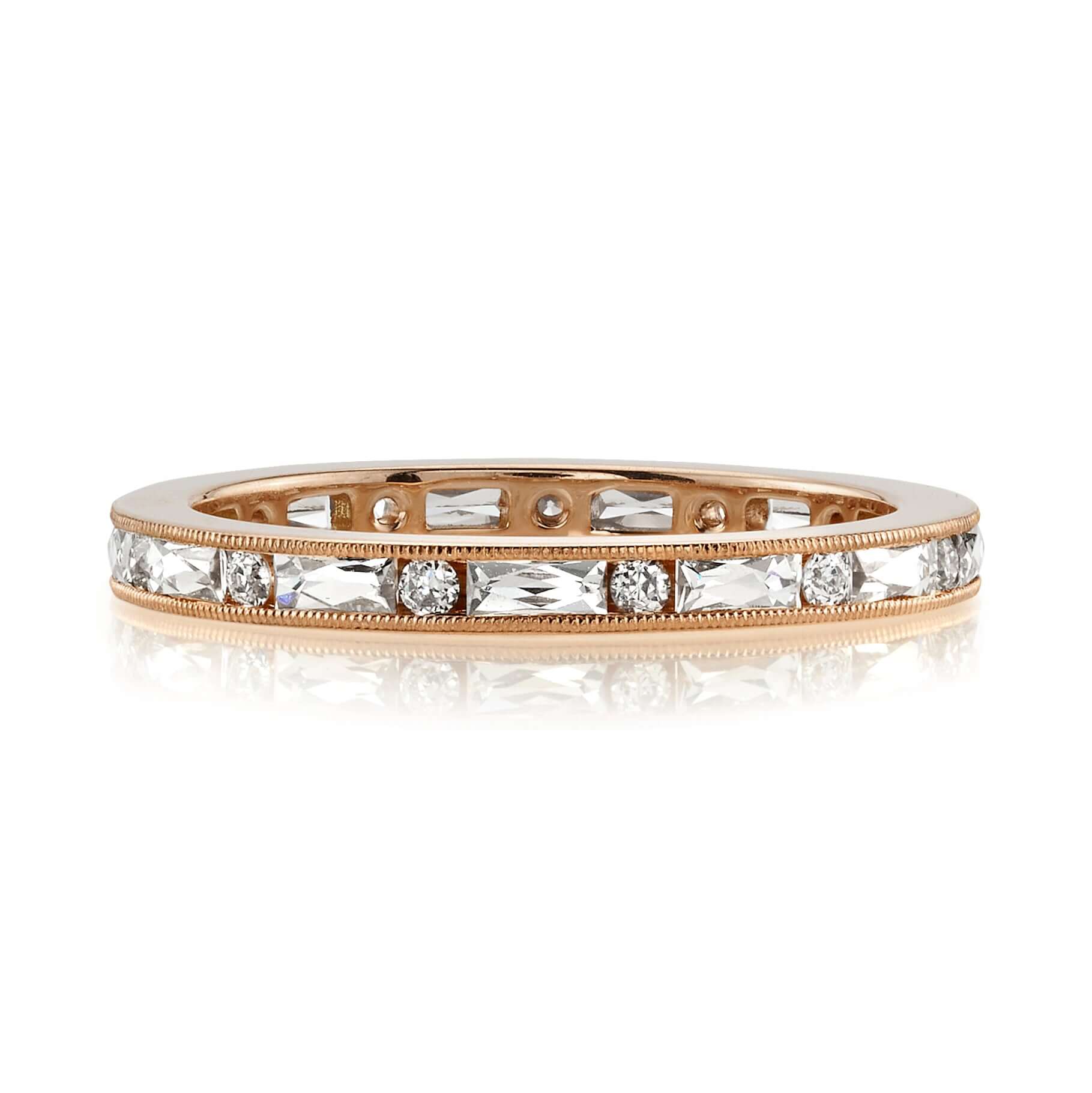 SINGLE STONE PAIGE BAND | Approximately 0.75ctw G-H/VS alternating French and old European cut diamonds channel set in a handcrafted eternity band. Approximate band with 2.1mm. Please inquire for additional customization.