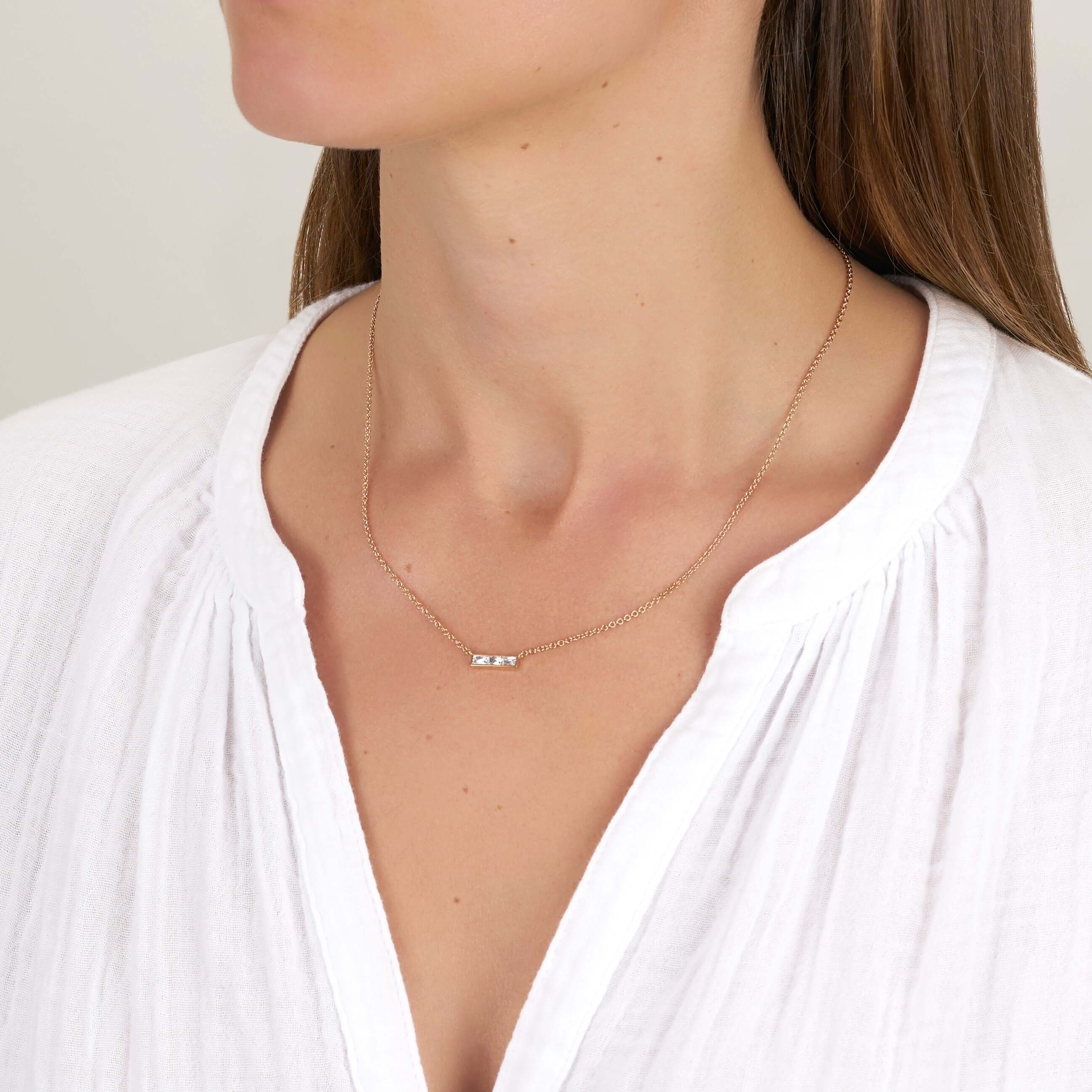 SINGLE STONE MONET NECKLACE featuring Approximately 0.40ctw G-H/VS French cut diamonds set in a handcrafted bar pendant. Necklace measures 17".
