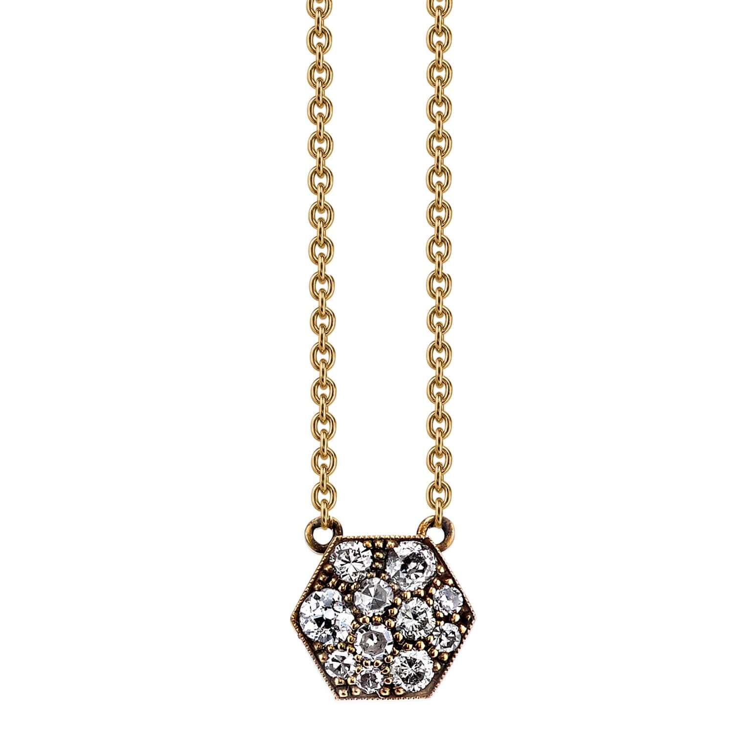 SINGLE STONE HEXAGONAL COBBLESTONE PENDANT NECKLACE featuring Approximately 0.30ctw varying old cut and round brilliant cut diamonds set in a handcrafted 18K yellow gold pendant on an 18K yellow gold chain. Available in an oxidized or polished finish. Nec