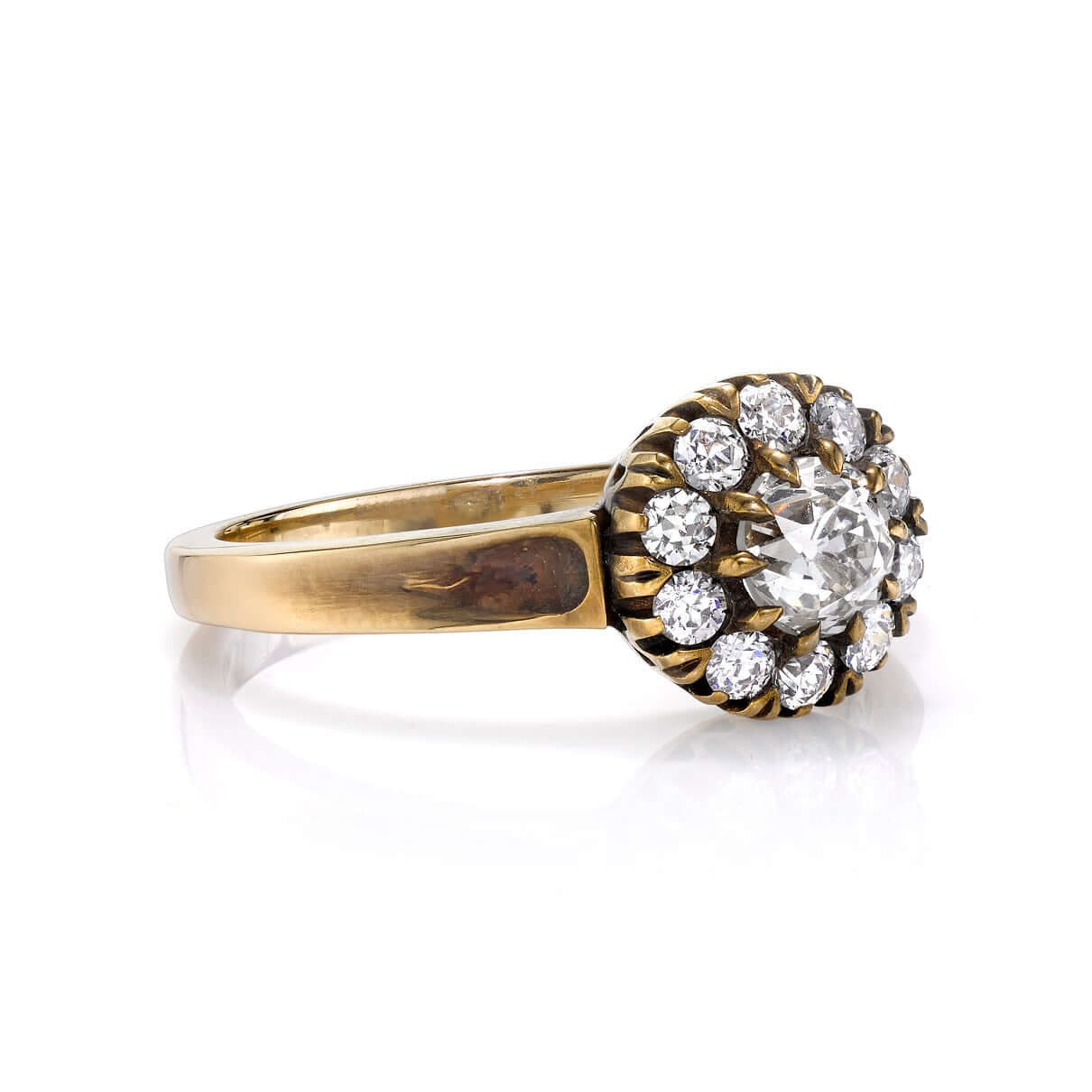 SINGLE STONE TALIA RING featuring 0.47ct L-M/VS antique old mine cut diamond with 0.35ctw old European cut accent diamonds set in a handcrafted oxidized 18K yellow and champagne gold mounting.