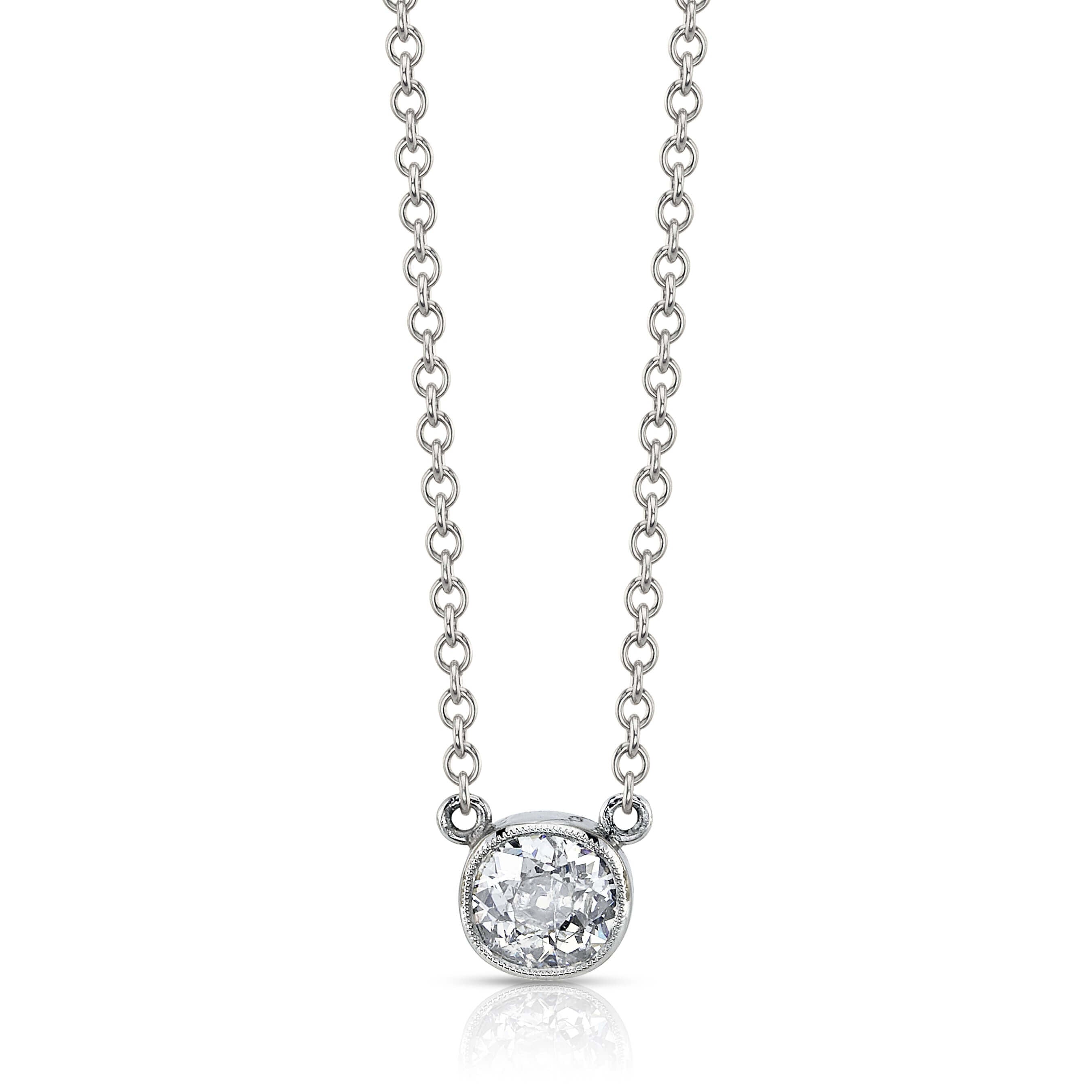 SINGLE STONE LINCOLN NECKLACE featuring 0.65ctw J/I1 antique cushion cut diamond bezel set on a handcrafted platinum necklace. Necklace measures 17".