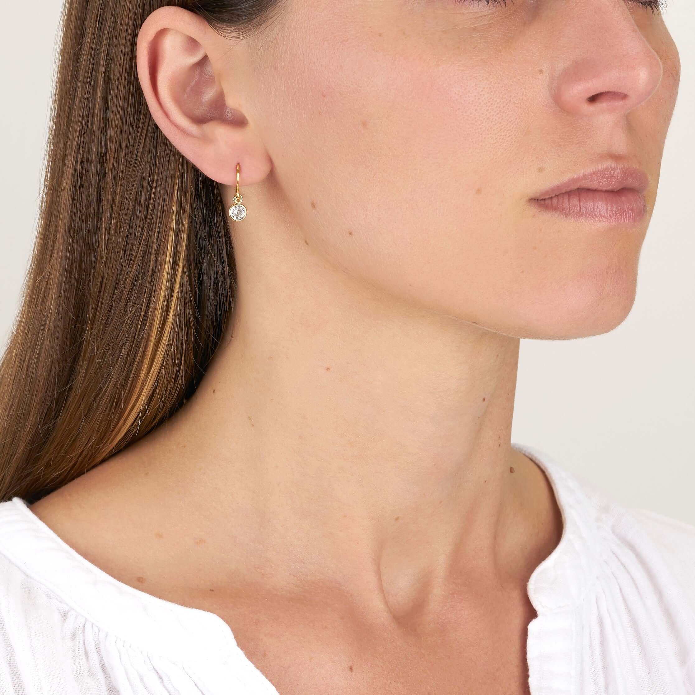 SINGLE STONE ANITA DROPS | Earrings featuring 0.93ctw J-K/SI old European cut diamonds bezel set in handcrafted 18K yellow gold drop earrings.