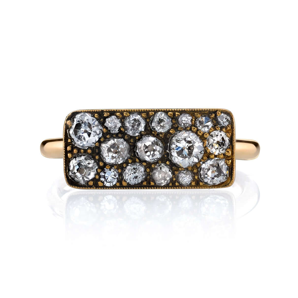SINGLE STONE MILO COBBLESTONE RING RING featuring 0.95ctw various old cut and round brilliant cut diamonds set in a handcrafted 18K yellow gold mounting. Price may vary according to total diamond weight. *Cobblestone pattern may vary from piece to piece