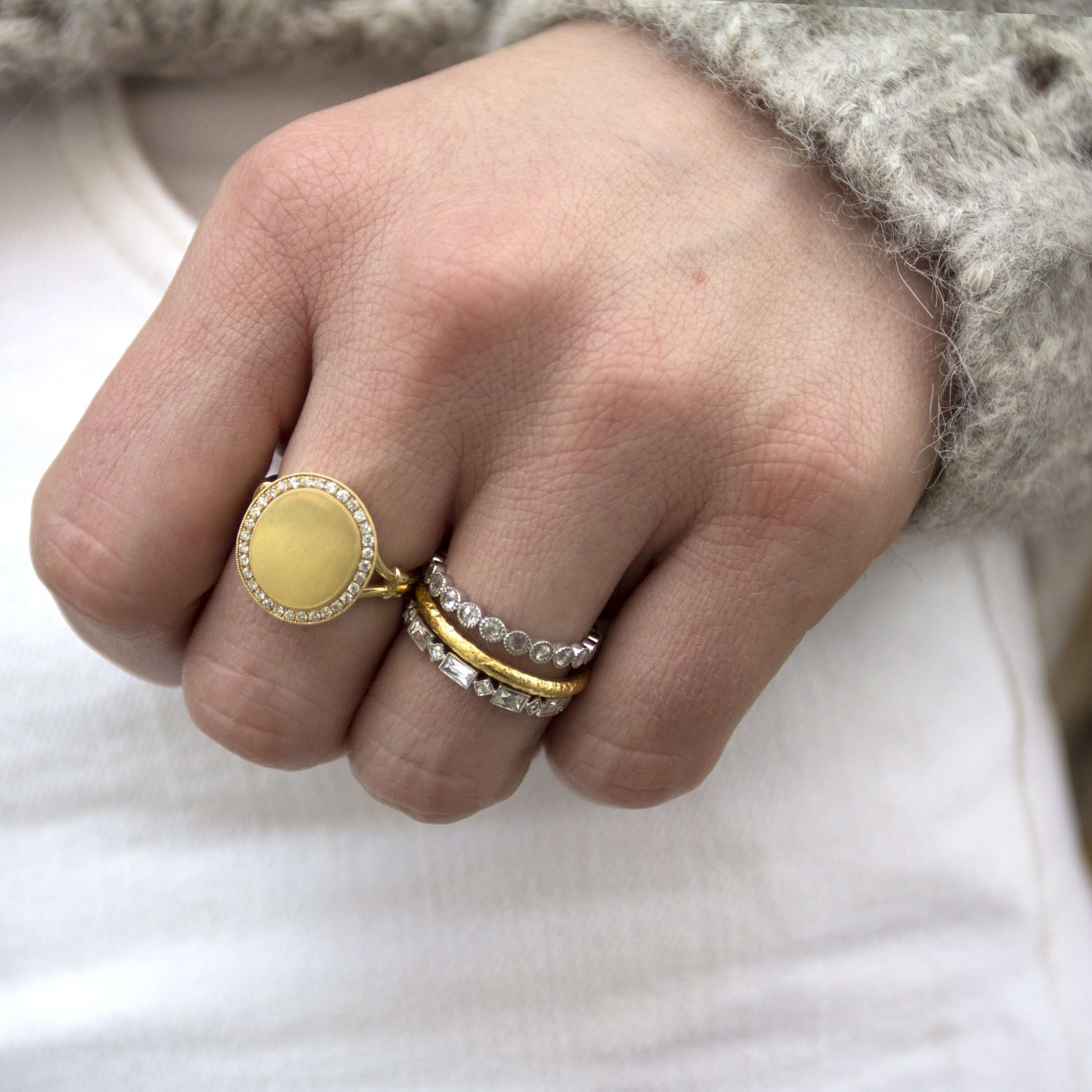 SINGLE STONE MADELINE BAND | Approximately 0.80-1.00ctw square and rectangular French cut diamonds bezel set in a handcrafted eternity band. Approximate band width 2.4mm. *Stone weight may vary from piece to piece. Please inquire for additional customizat