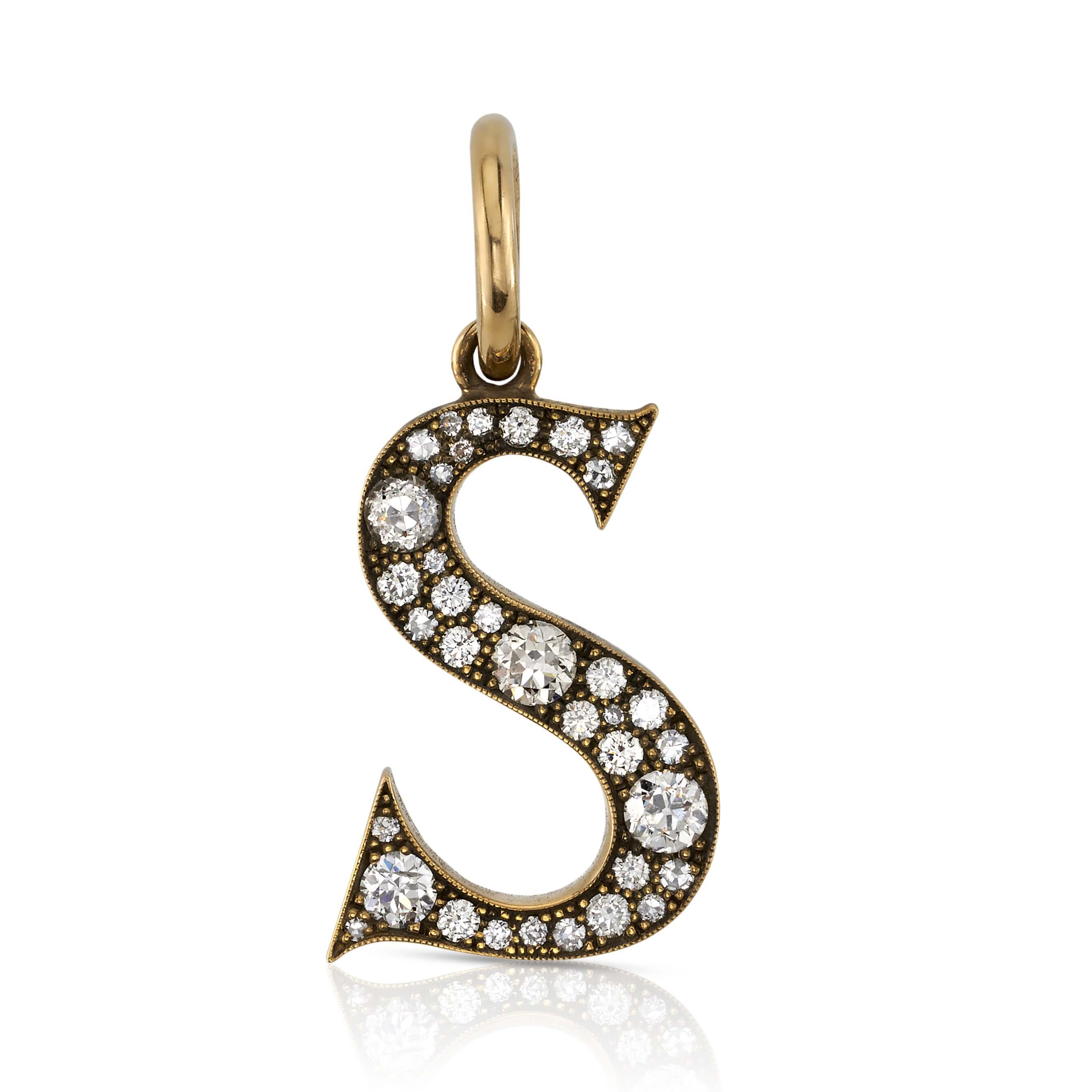 SINGLE STONE LARGE COBBLESTONE LETTERS PENDANT featuring Approximately 0.95ctw-2.75ctw varying old cut and round brilliant cut diamonds set in a handcrafted 18K yellow gold letter pendant. Letters are approximately 1" tall. Available in an oxidized or pol