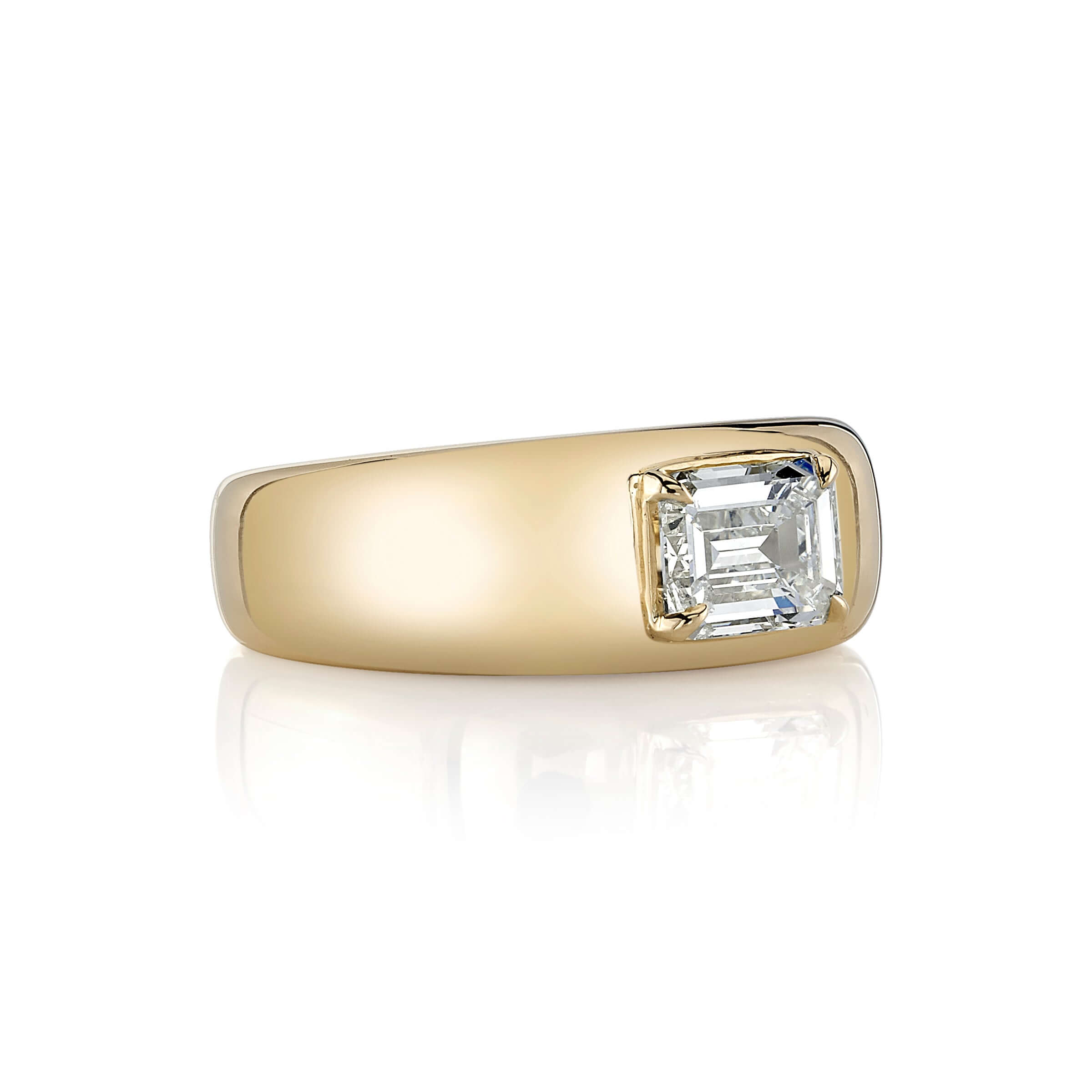 SINGLE STONE REMINGTON RING featuring 1.00ct U-V/SI1 GIA certified emerald cut diamond set in a handcrafted 18K yellow gold dome mounting.