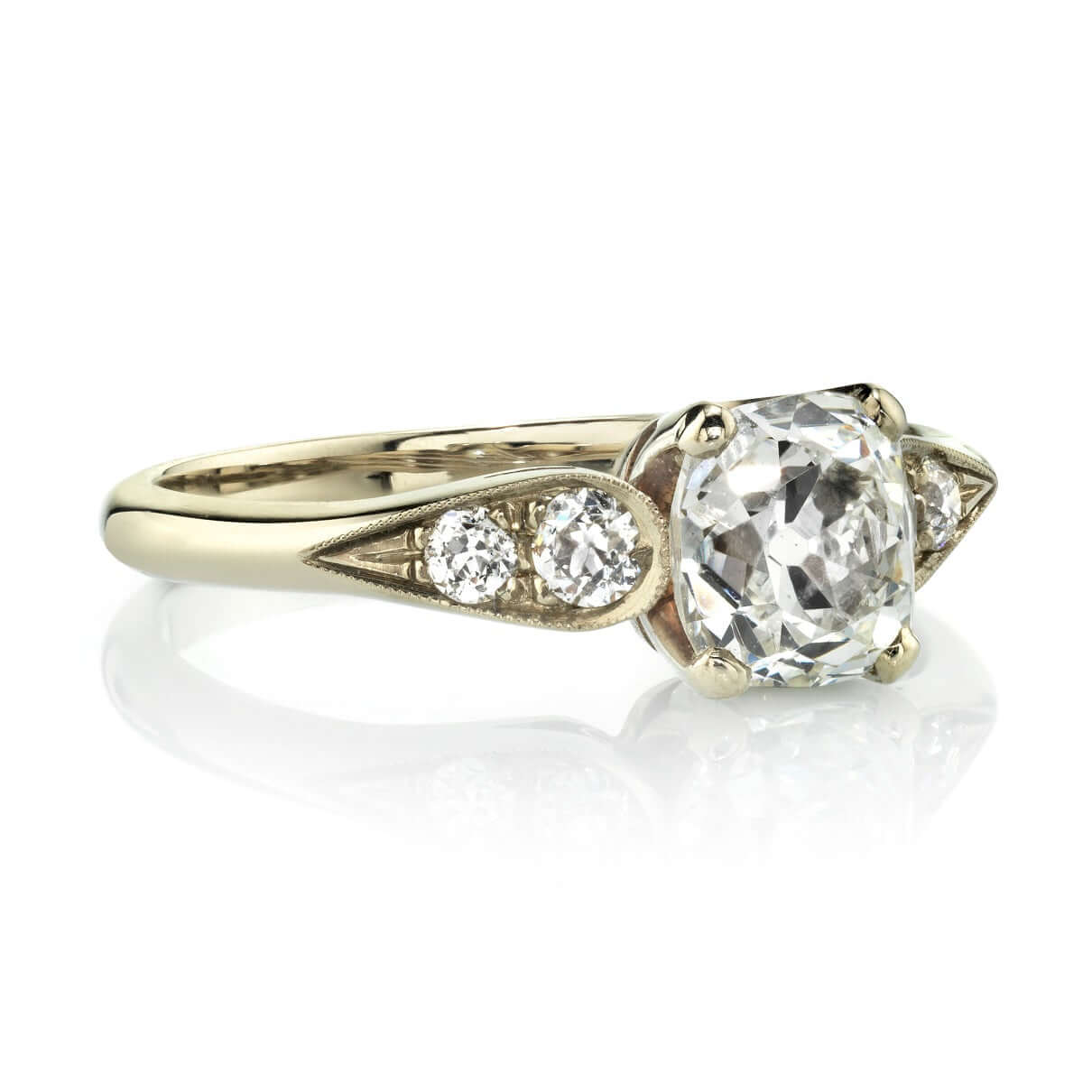 SINGLE STONE AMANDA RING featuring 1.12ct H/VS2 EGL certified antique cushion cut diamond with 0.22ctw old European cut accent diamonds set in a handcrafted 18K champagne gold mounting.