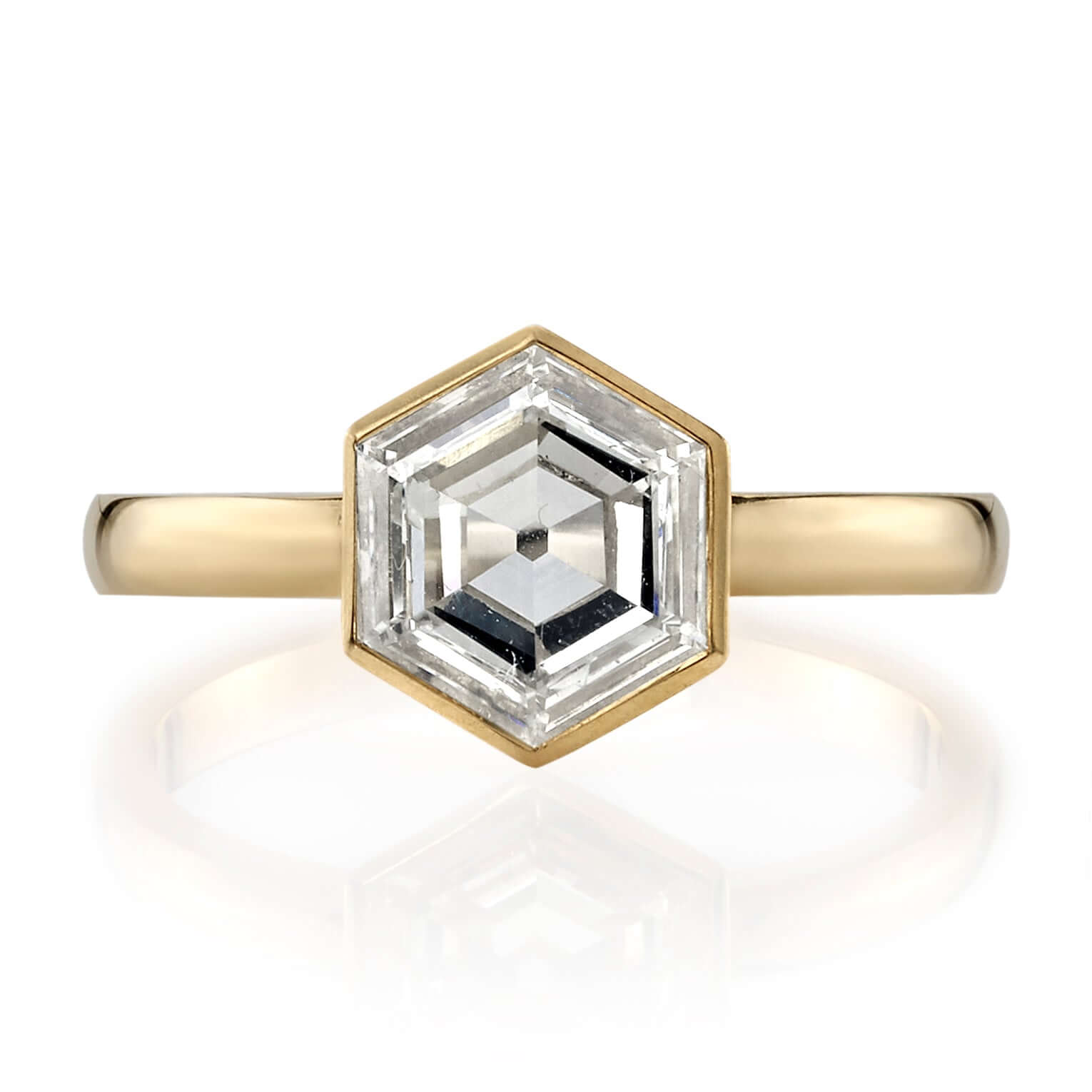 SINGLE STONE WYLER RING featuring 1.18ct L/VS2 GIA certified hexagonal cut diamond set in a handcrafted 18K yellow gold mounting.