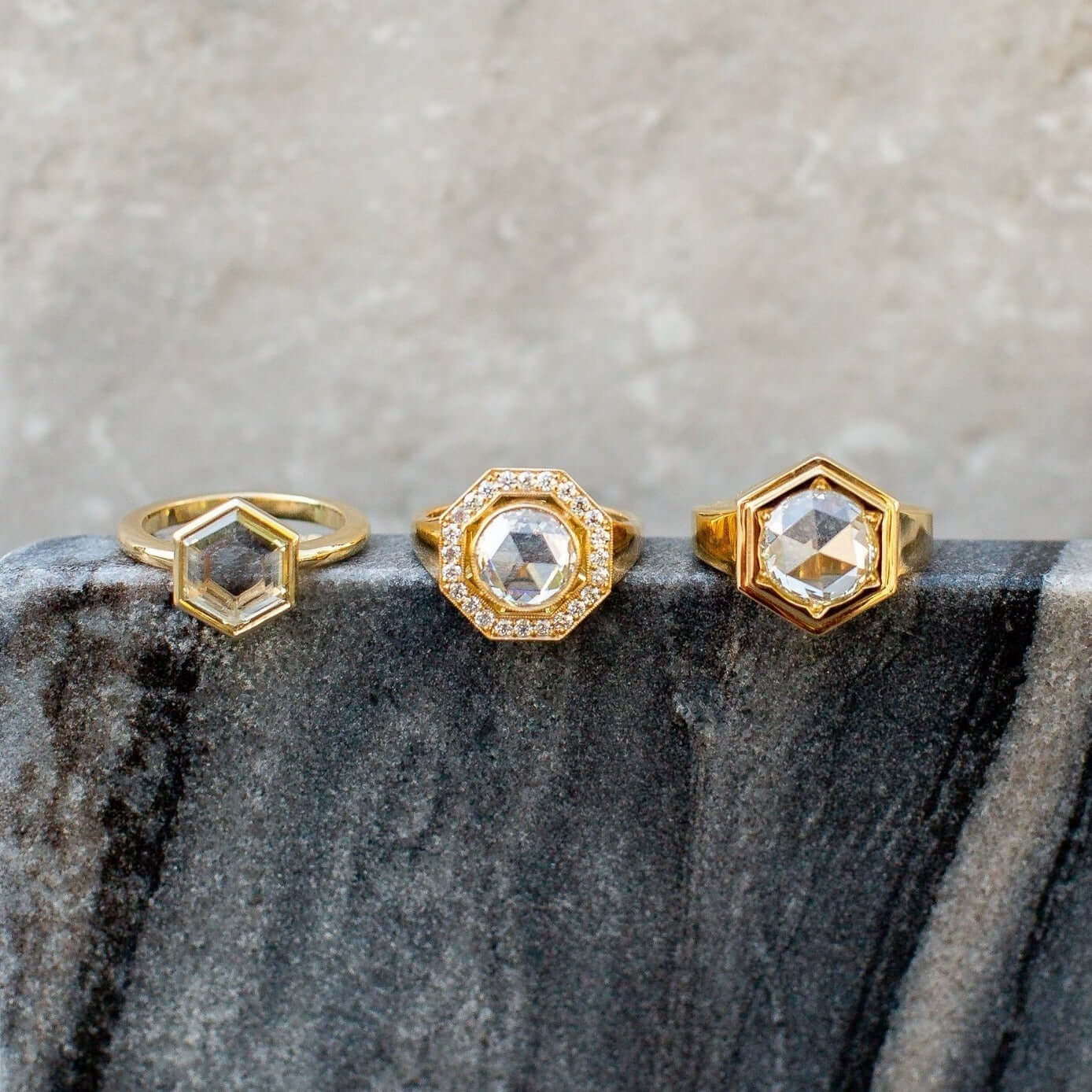 SINGLE STONE WYLER RING featuring 1.18ct L/VS2 GIA certified hexagonal cut diamond set in a handcrafted 18K yellow gold mounting.