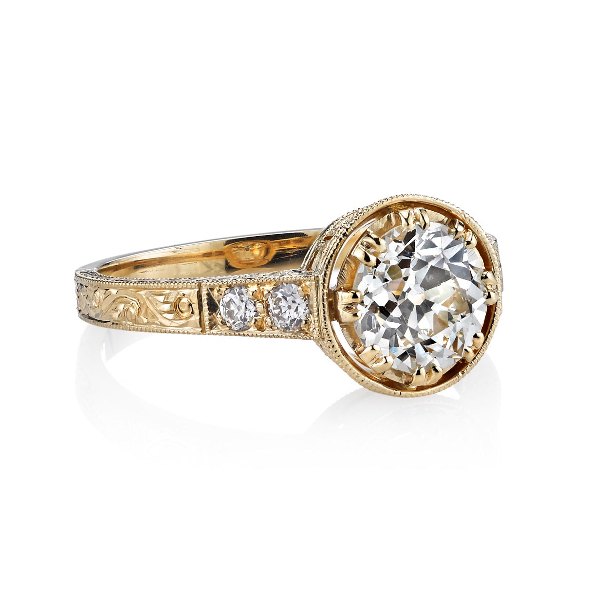 SINGLE STONE AUBREY RING featuring 1.20ct J/VS2 EGL certified old European cut diamond with 0.13ctw old European cut accent diamonds set in a handcrafted 18K yellow gold mounting.