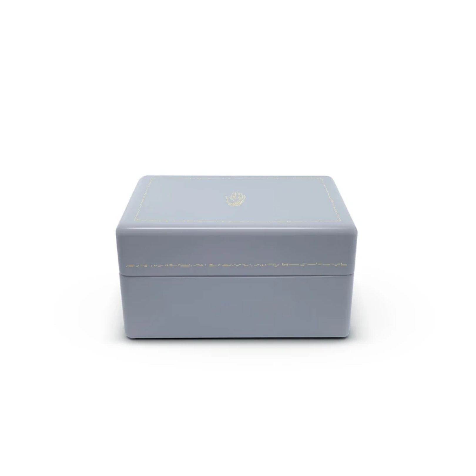 EVENING BLUE MINI TRUNK, Color: Dusty blue top and indigo interior Wood with high lacquer finish 3 levels of storage Features delicate gold effect inlay Brass plated hardware Faux suede interior 10" x 6.9" x 5.1" Due to the nature of lacquer, there may be