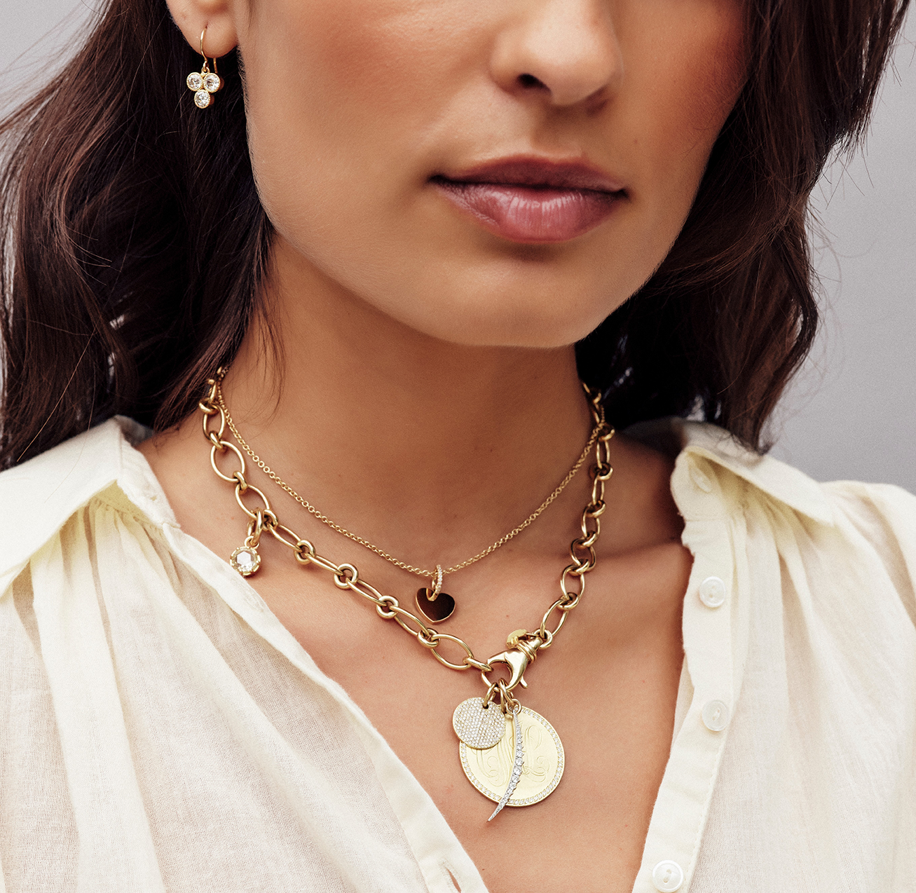 SINGLE STONE COMPLETE PAVE ROUND DISC PENDANT featuring Old European cut diamonds pave set in a handcrafted 18K yellow gold engravable round pendant. Ctw varies by disc size. Option of monogrammed engraving of up to three letters. Please contact us to inq