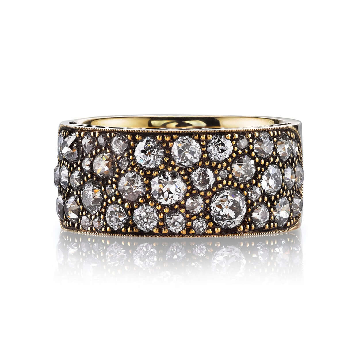 SINGLE STONE COBBLESTONE BAND BAND | Approximately 2.25ctw varying old cut and round brilliant cut diamonds set in a handcrafted 18K yellow gold band. Approximate band width 8.9mm. *Cobblestone pattern may vary from piece to piece Please inquire for addit
