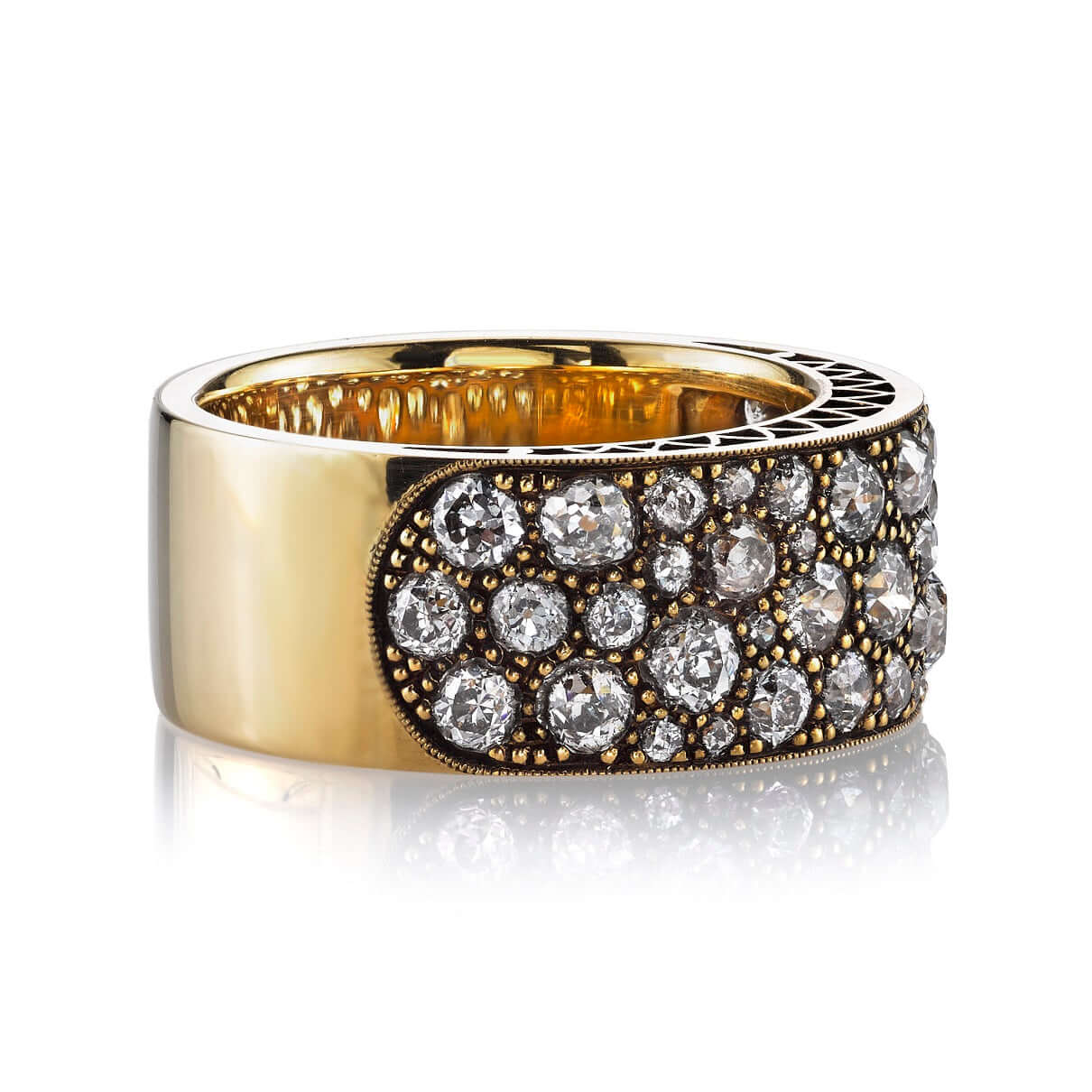 SINGLE STONE COBBLESTONE BAND BAND | Approximately 2.25ctw varying old cut and round brilliant cut diamonds set in a handcrafted 18K yellow gold band. Approximate band width 8.9mm. *Cobblestone pattern may vary from piece to piece Please inquire for addit
