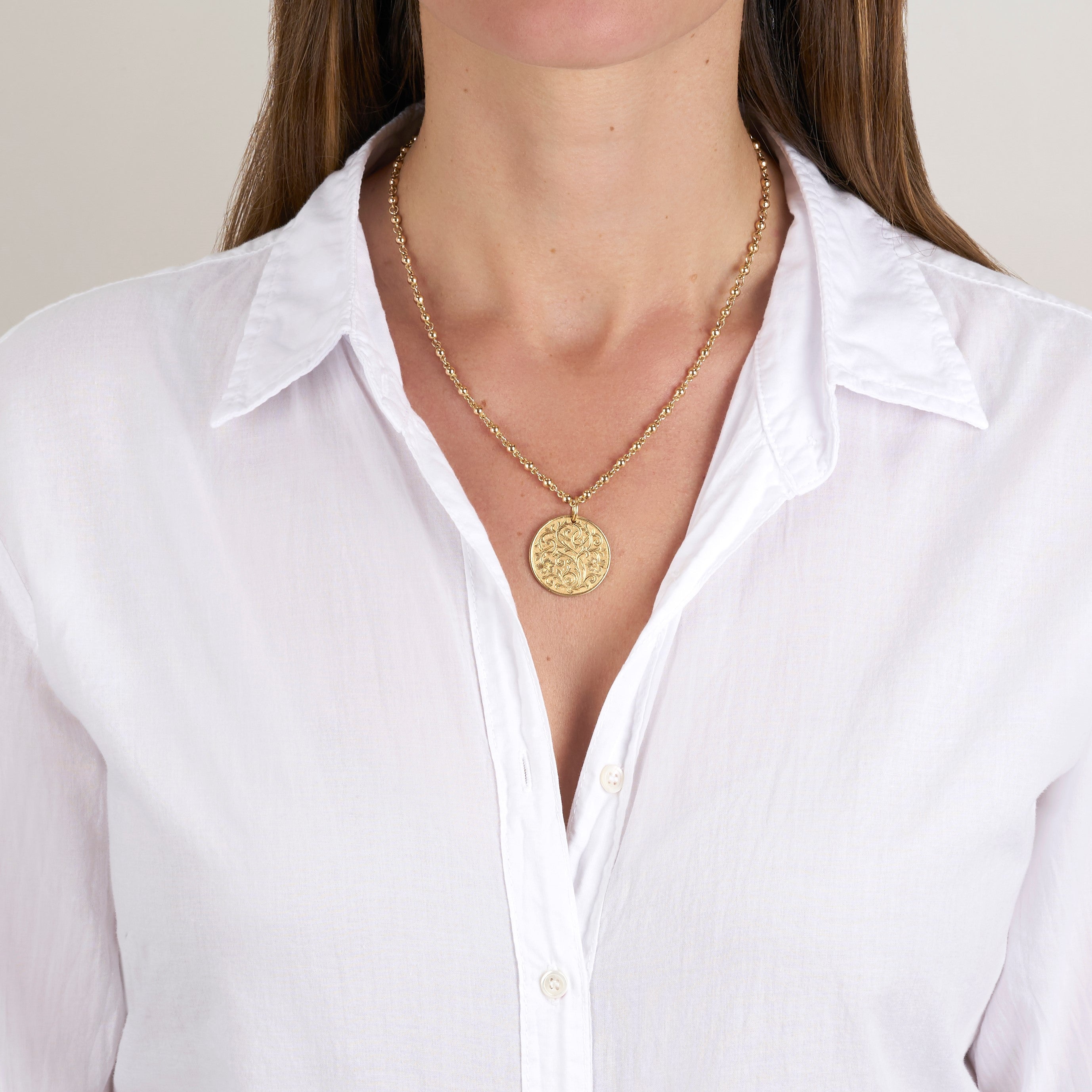 SINGLE STONE FLORAL ENGRAVED ROUND DISC PENDANT featuring Handcrafted 18K yellow gold engravable round pendant with engraved floral design. Price includes monogrammed engraving of up to three letters in any of the styles shown above - please be sure to sp