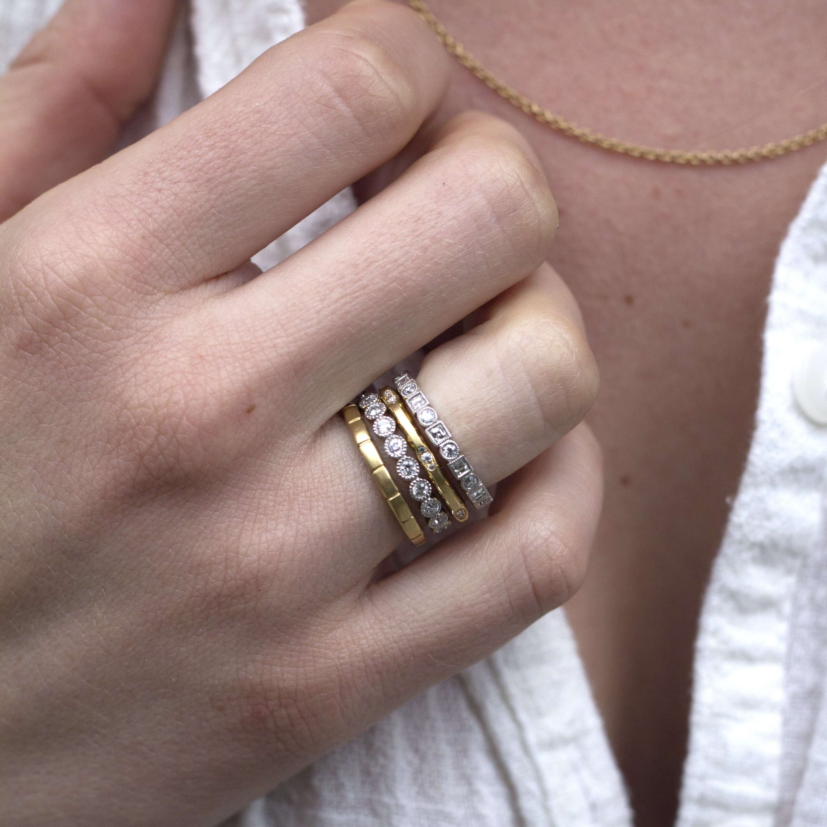 SINGLE STONE ADDIE BAND | Approximately 0.95ctw G-H/VS carré and old European cut diamonds set in a handcrafted eternity band. Approximate band width 2.6mm. Please inquire for additional customization.