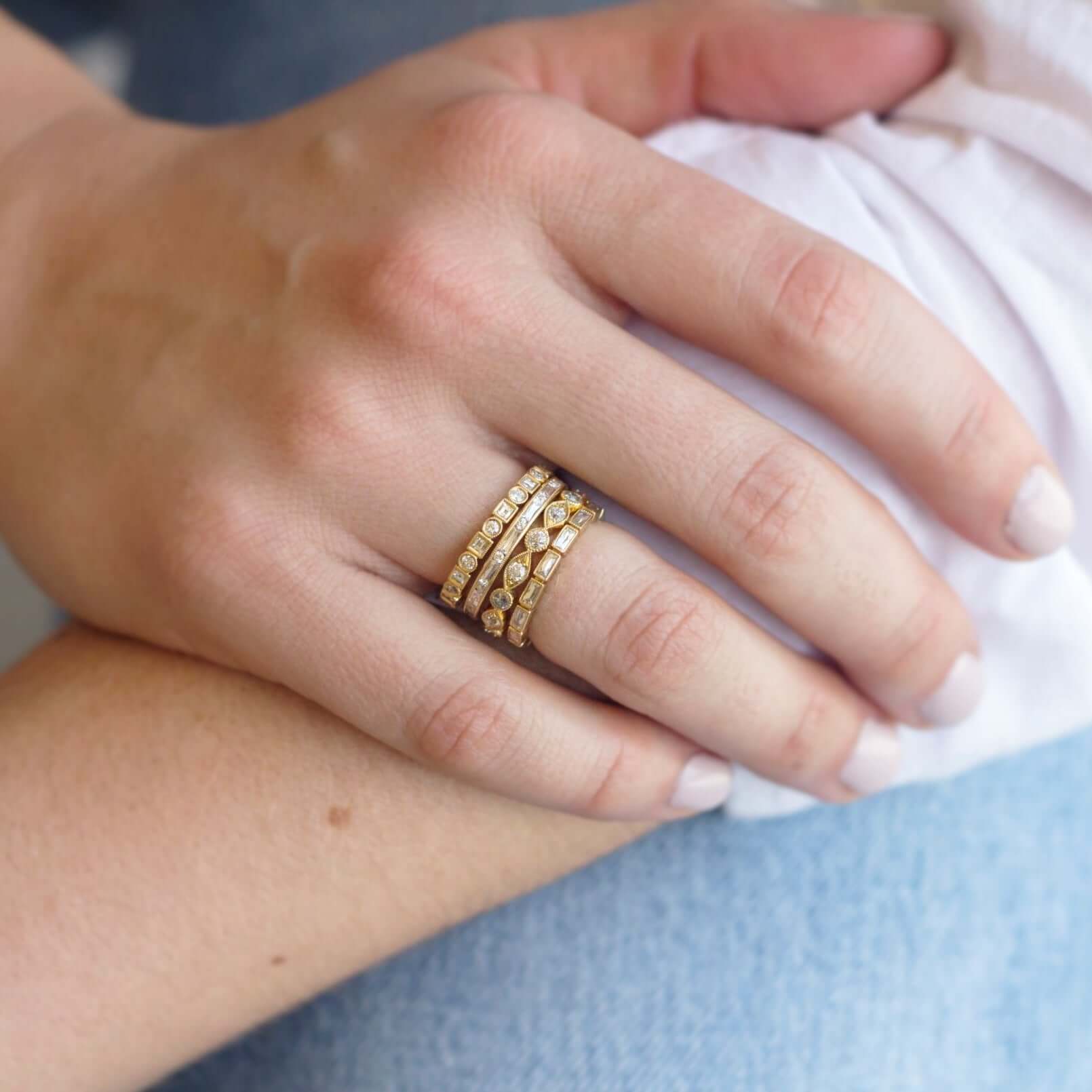 SINGLE STONE ADDIE BAND | Approximately 0.95ctw G-H/VS carré and old European cut diamonds set in a handcrafted eternity band. Approximate band width 2.6mm. Please inquire for additional customization.