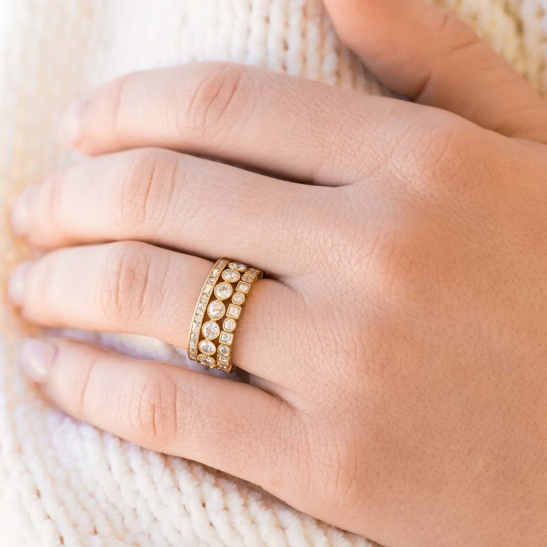 SINGLE STONE ADDIE BAND | Approximately 0.95ctw G-H/VS carré and old European cut diamonds set in a handcrafted eternity band. Approximate band width 2.6mm. Please inquire for additional customization.