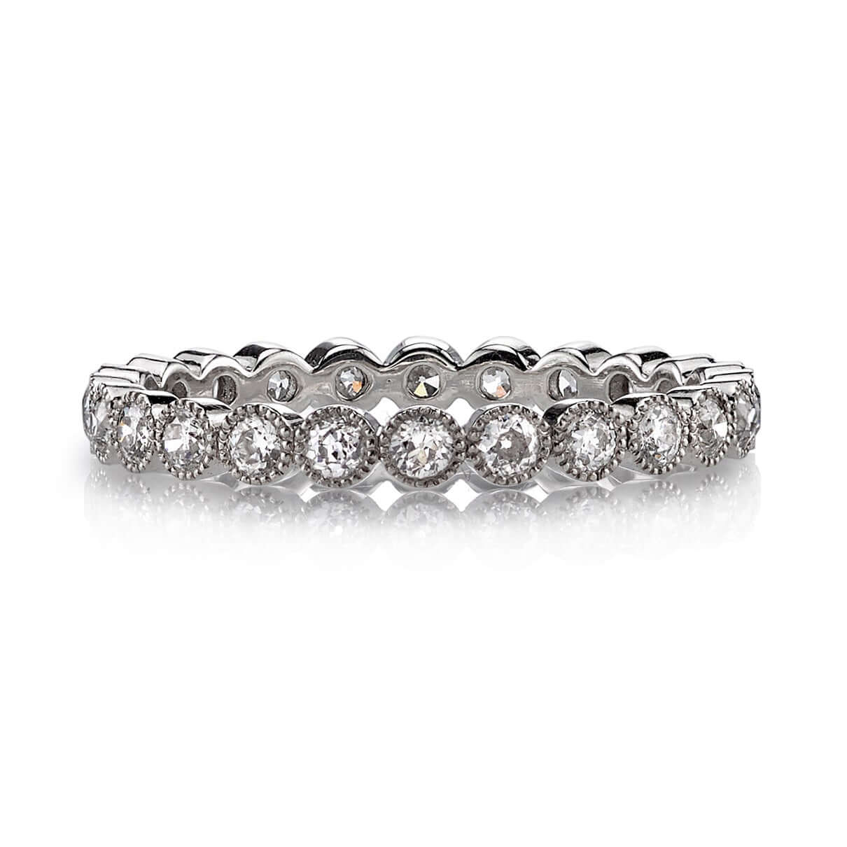 SINGLE STONE MINI GABBY BAND | Approximately 0.70ctw old European cut diamonds set in a handcrafted bezel set eternity band. Approximate band width 2.4mm. Please inquire for additional customization,