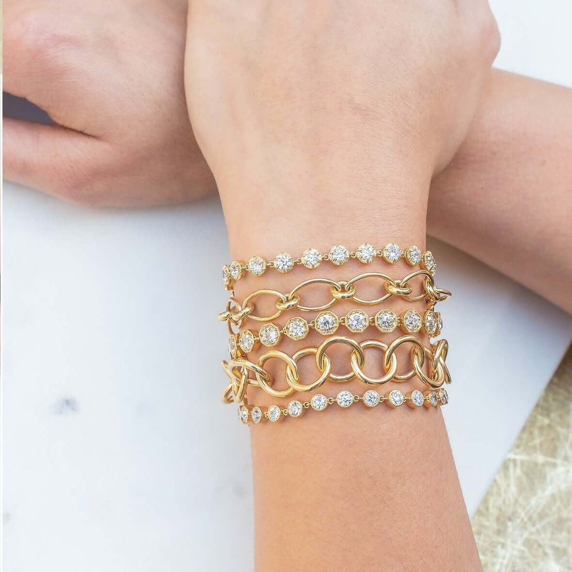 SINGLE STONE ARIELLE BRACELET featuring 4.82ctw G-H/VS-SI old European cut diamonds set in a handcrafted 18K yellow gold diamond tennis bracelet.