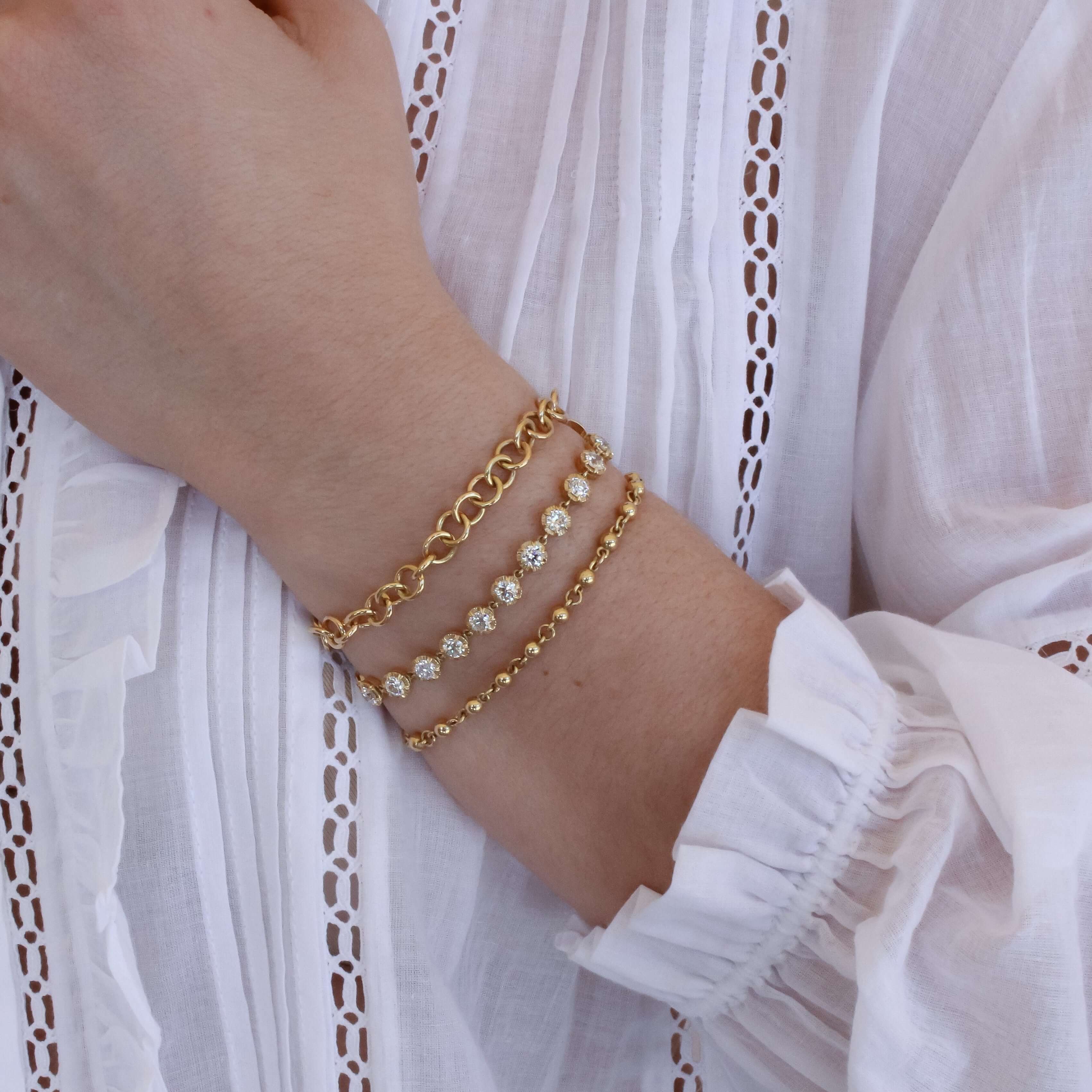 SINGLE STONE ARIELLE BRACELET featuring 4.82ctw G-H/VS-SI old European cut diamonds set in a handcrafted 18K yellow gold diamond tennis bracelet.