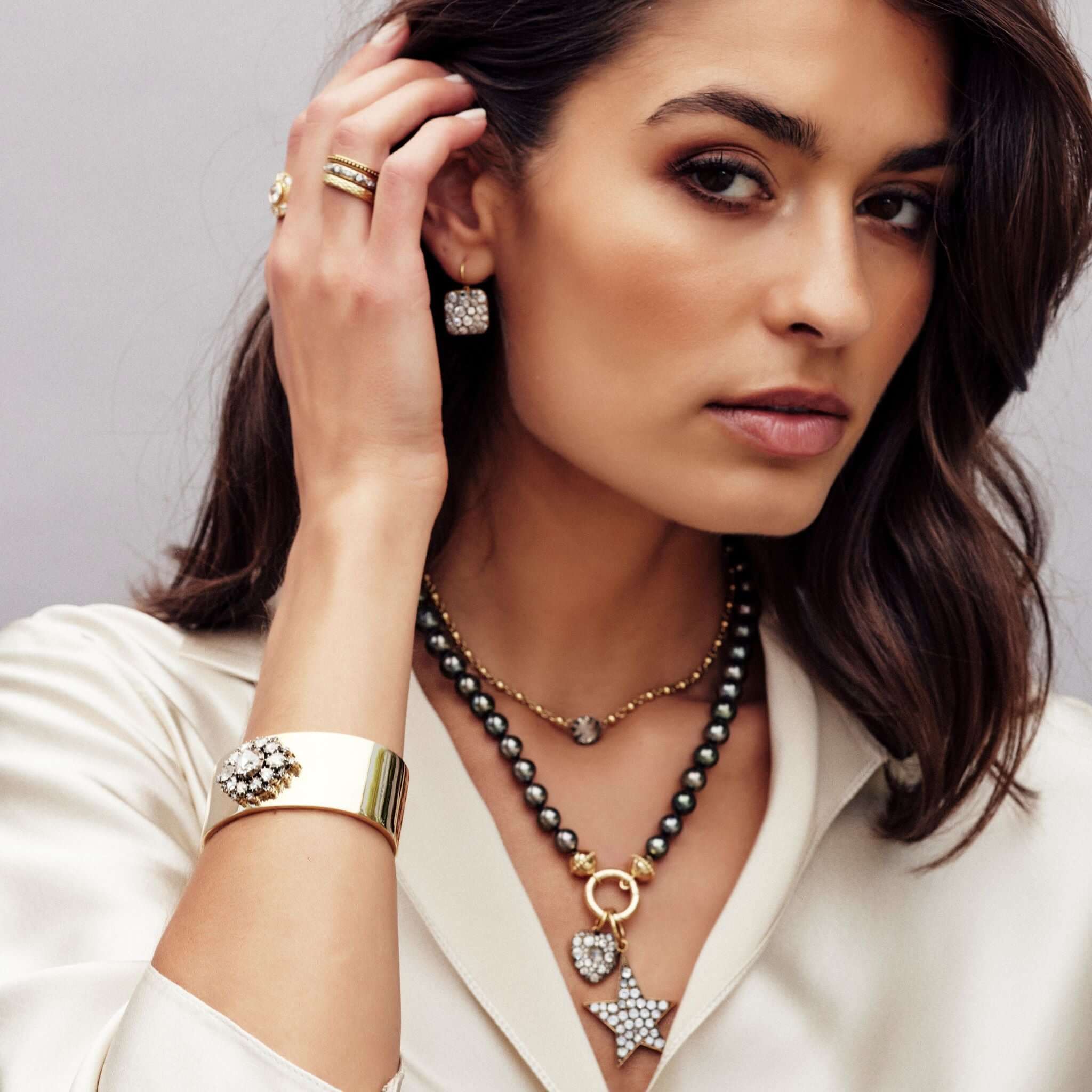 Single Stone ASHLYN CUFF featuring 2.50ct Rose cut diamond with 2.25ctw Rose cut diamond surround set in an oxidized silver mounting on a handcrafted 18k yellow gold cuff.