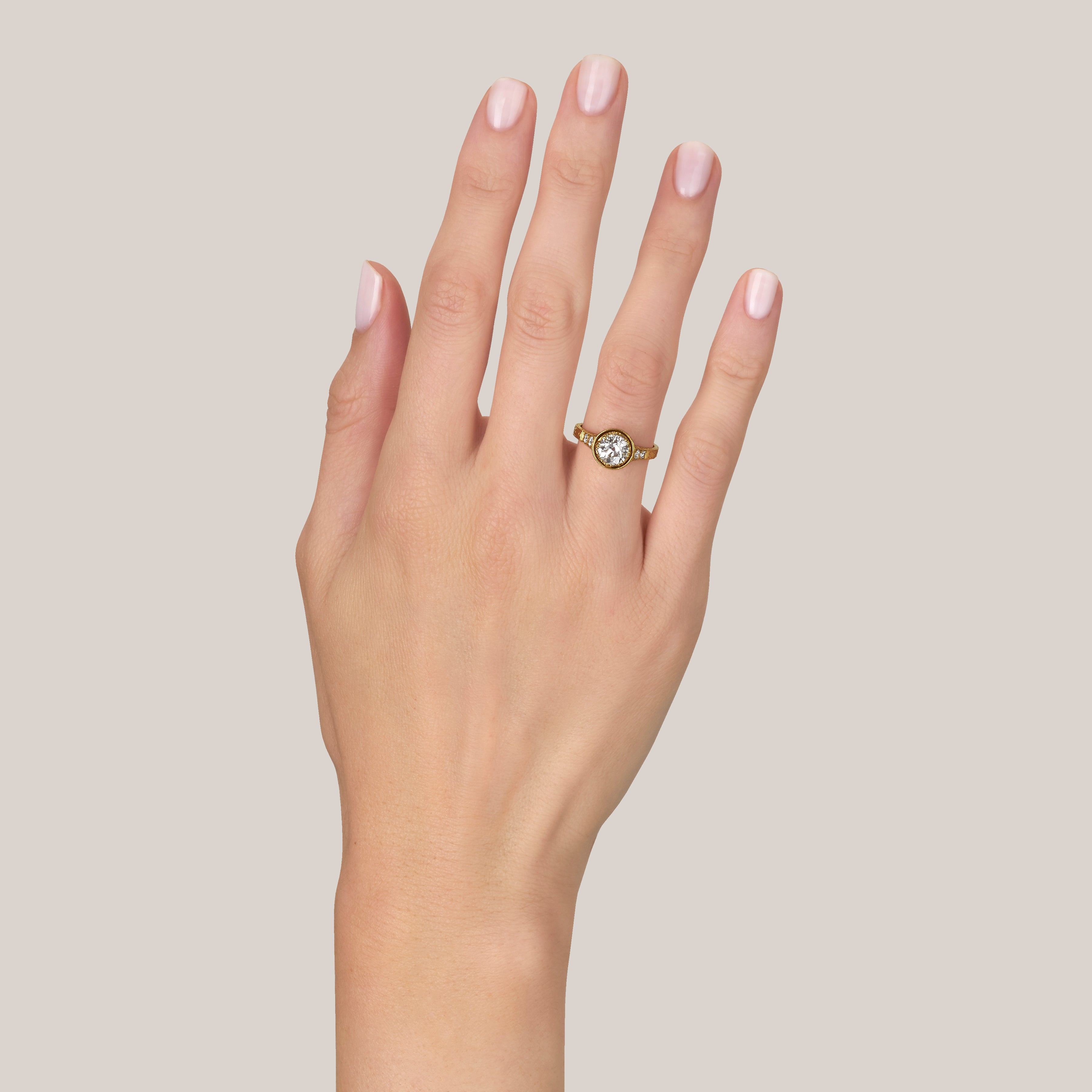 SINGLE STONE AUBREY RING featuring 1.20ct J/VS2 EGL certified old European cut diamond with 0.13ctw old European cut accent diamonds set in a handcrafted 18K yellow gold mounting.