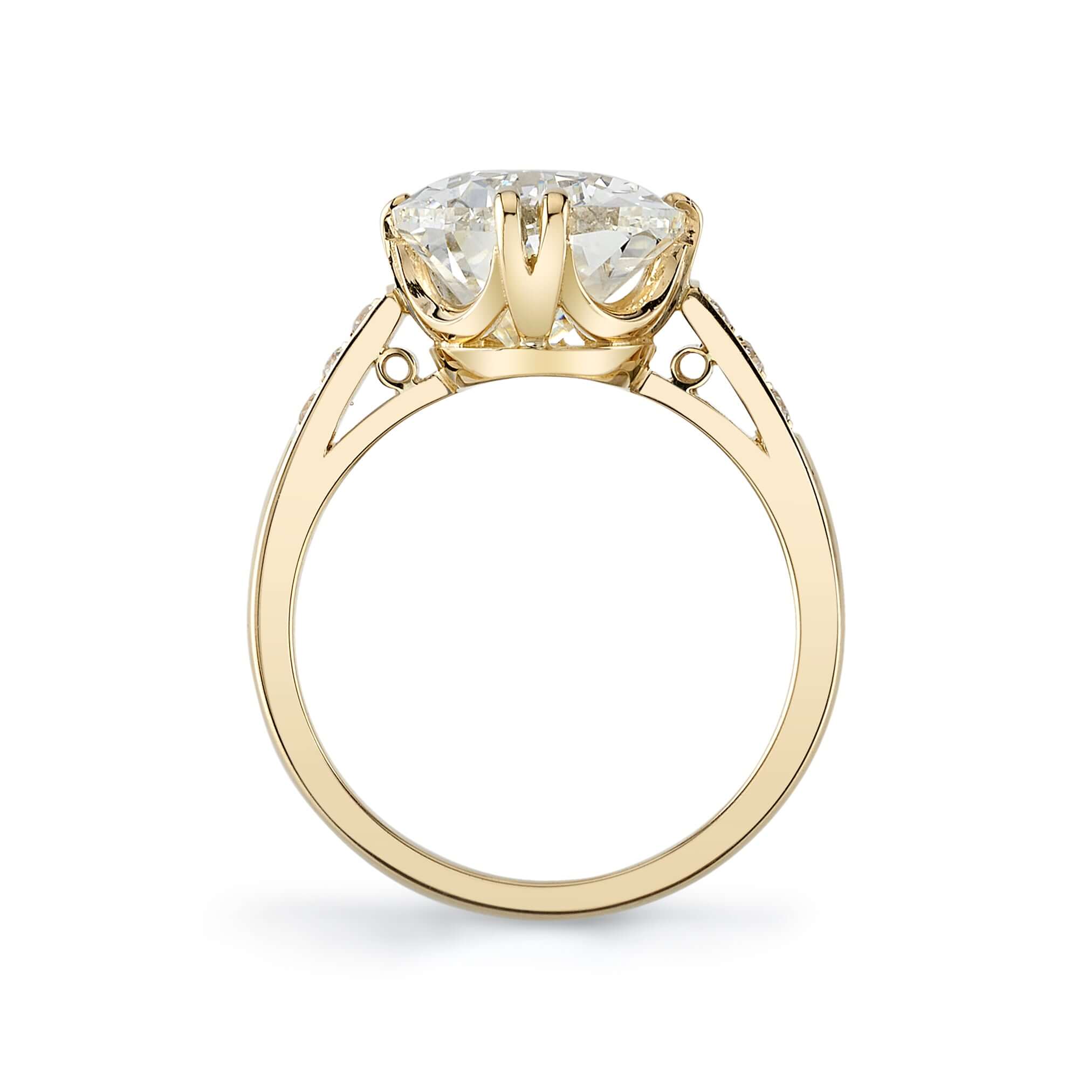 SINGLE STONE BAUER RING featuring 5.00ct L/VVS1 GIA certified antique pear shaped diamond with 0.11ctw old European cut accent diamonds set in a handcrafted 18K yellow gold mounting.