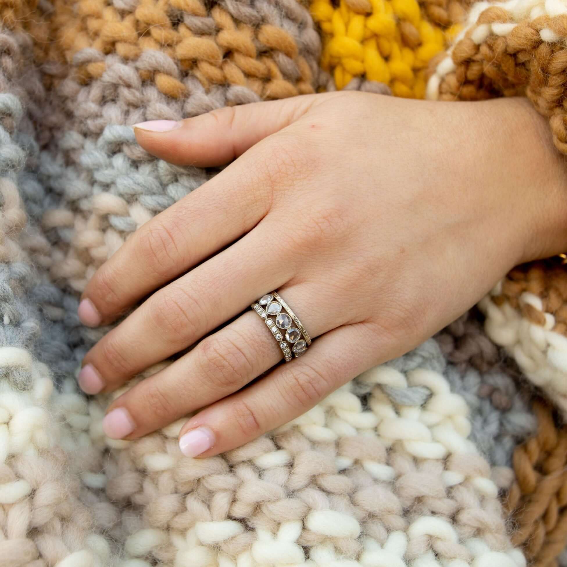 SINGLE STONE CARLY BAND | Approximately 0.30ctw G-H/VS old European cut diamonds prong set in a handcrafted geometric sectional eternity band. Approximate band width 2.1mm. Please inquire for additional customization.