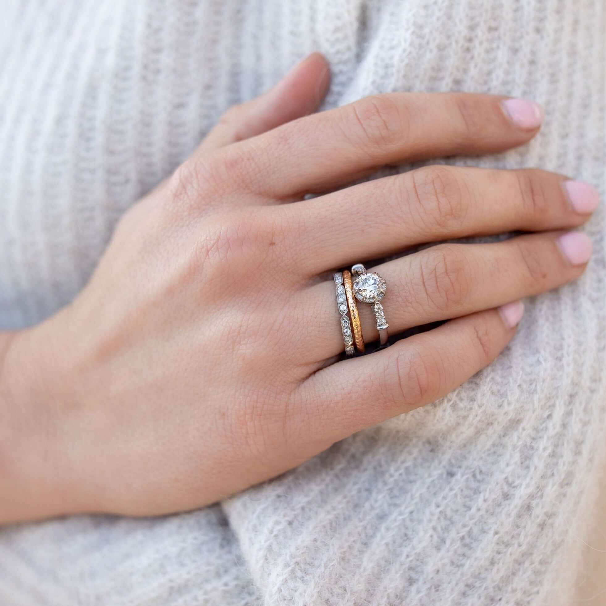 SINGLE STONE CARLY BAND | Approximately 0.30ctw G-H/VS old European cut diamonds prong set in a handcrafted geometric sectional eternity band. Approximate band width 2.1mm. Please inquire for additional customization.