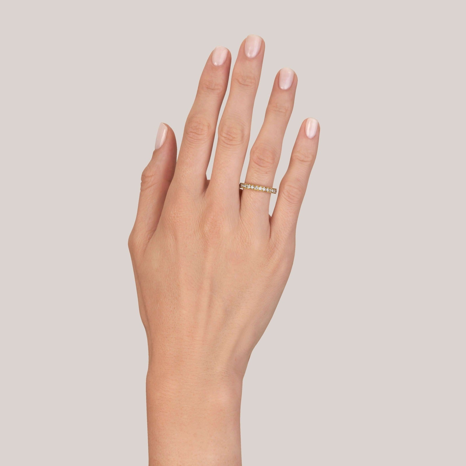 SINGLE STONE CARMELA SMALL BAND | Approximately 1.00ctw G-H/VS old European cut diamonds channel set in a handcrafted eternity band. Approximate band width 2.8mm. Please inquire for additional customization.