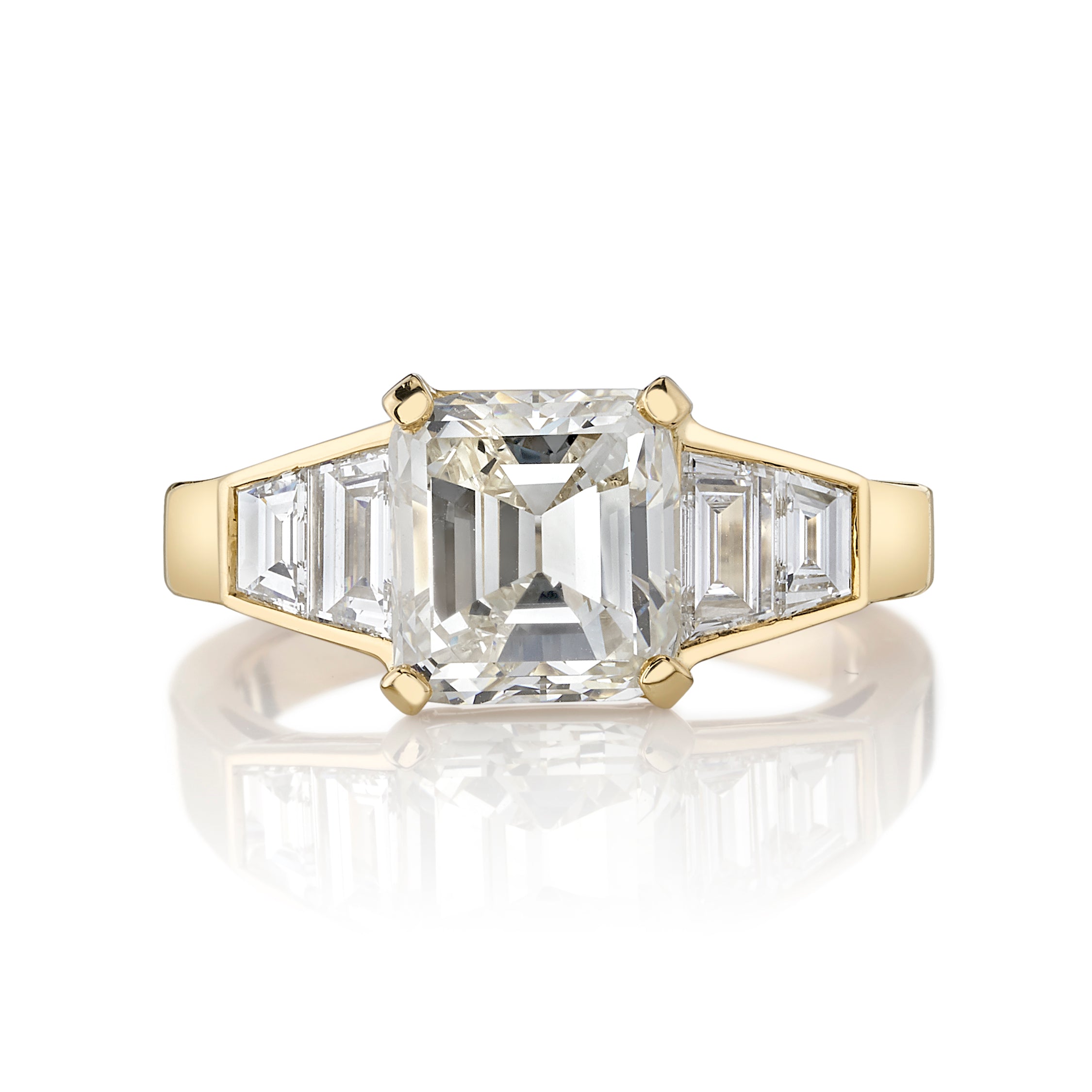 SINGLE STONE CASSIDY RING featuring 2.60ct L/SI1 GIA certified vintage Asscher cut diamond with 0.86ctw trapezoid cut accent diamonds set in a handcrafted 18K yellow gold mounting.