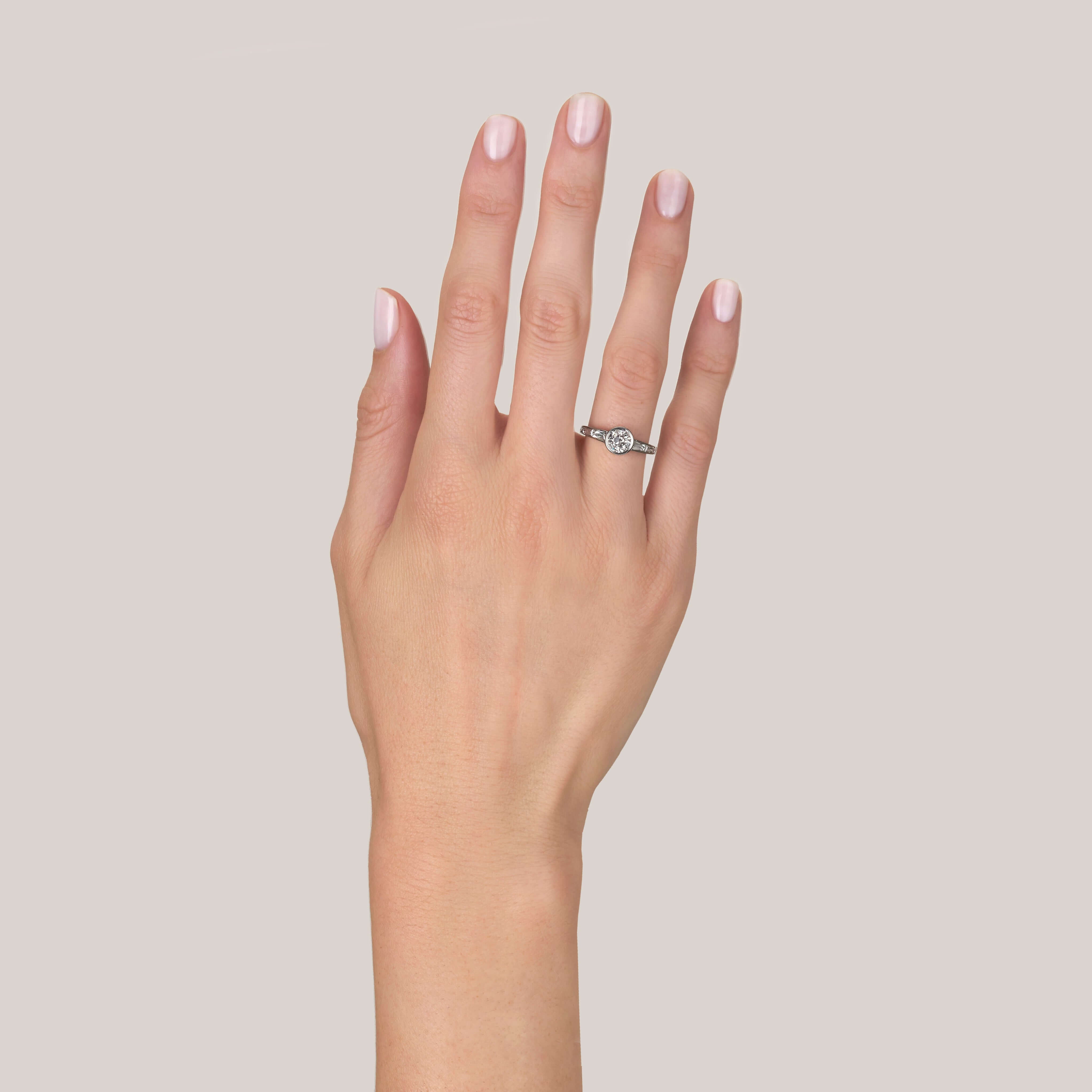 SINGLE STONE CHRISTINA RING featuring 1.04ct K/VS2 GIA certified old European cut diamond with 0.60ctw French cut accent diamonds set in a handcrafted platinum mounting.