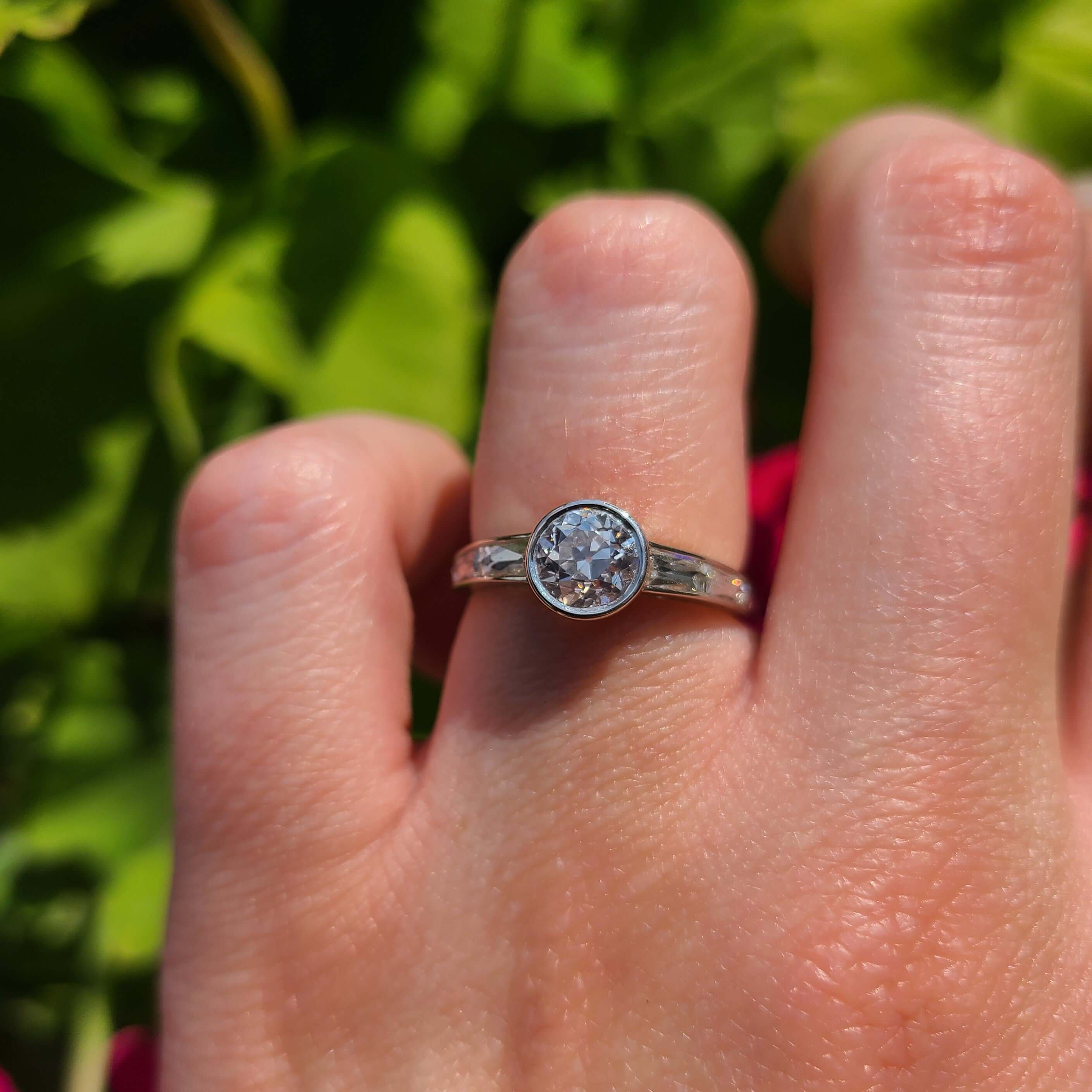 SINGLE STONE CHRISTINA RING featuring 1.04ct K/VS2 GIA certified old European cut diamond with 0.60ctw French cut accent diamonds set in a handcrafted platinum mounting.