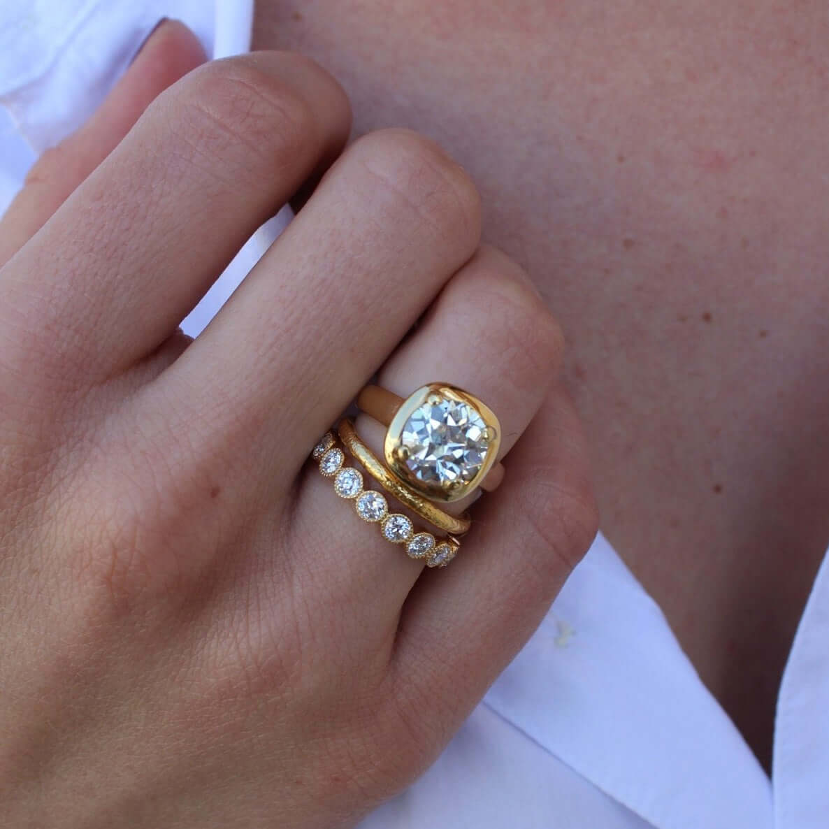 SINGLE STONE MEDIUM GABBY BAND | Approximately 1.75ctw old European cut diamonds set in a handcrafted bezel set eternity band. Approximate band with 3.6mm. Please inquire for additional customization.