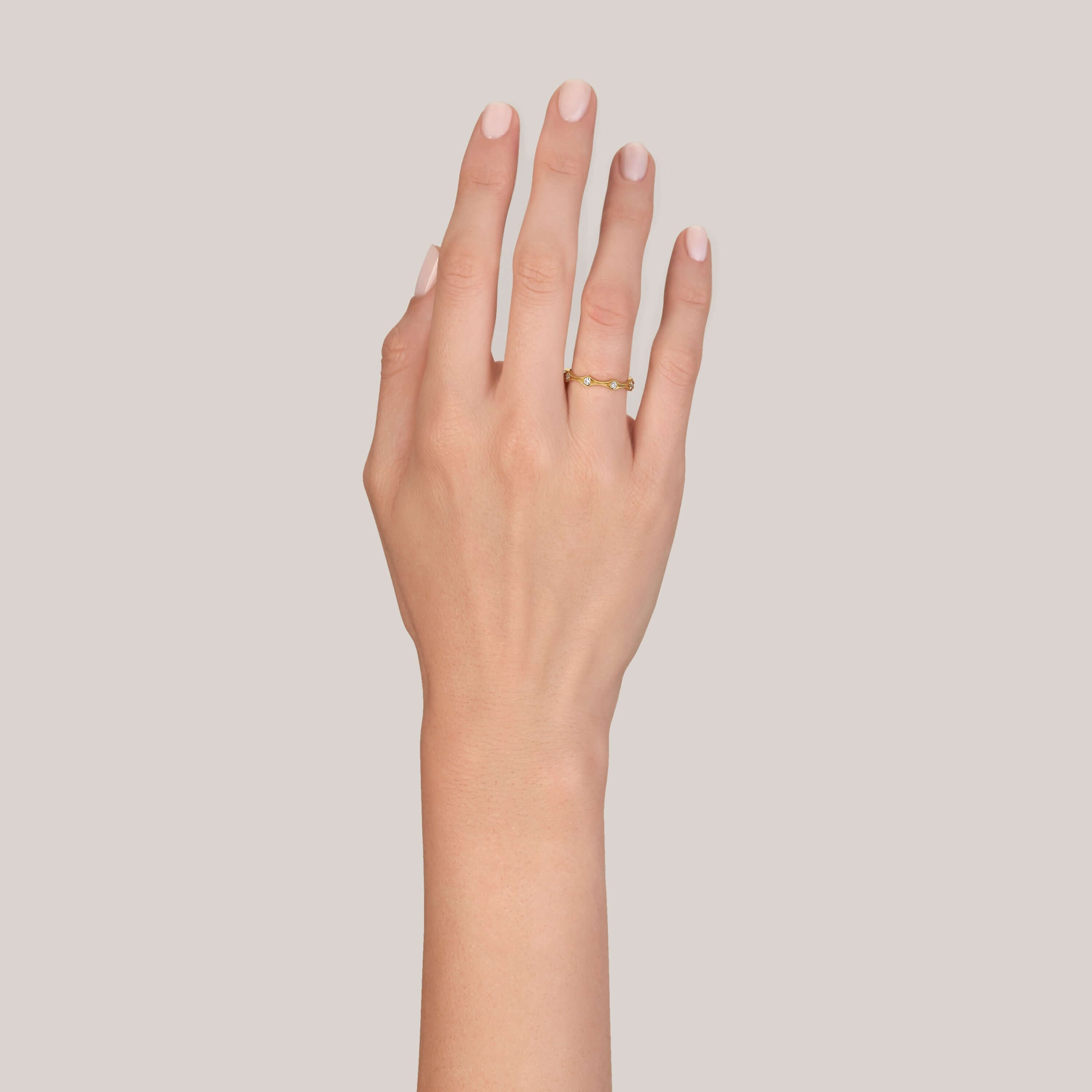 SINGLE STONE DIANA BAND | Approximately 0.50ctw old European cut diamonds set in a handcrafted eternity band. Approximate band width 3mm. Please inquire for additional customization.