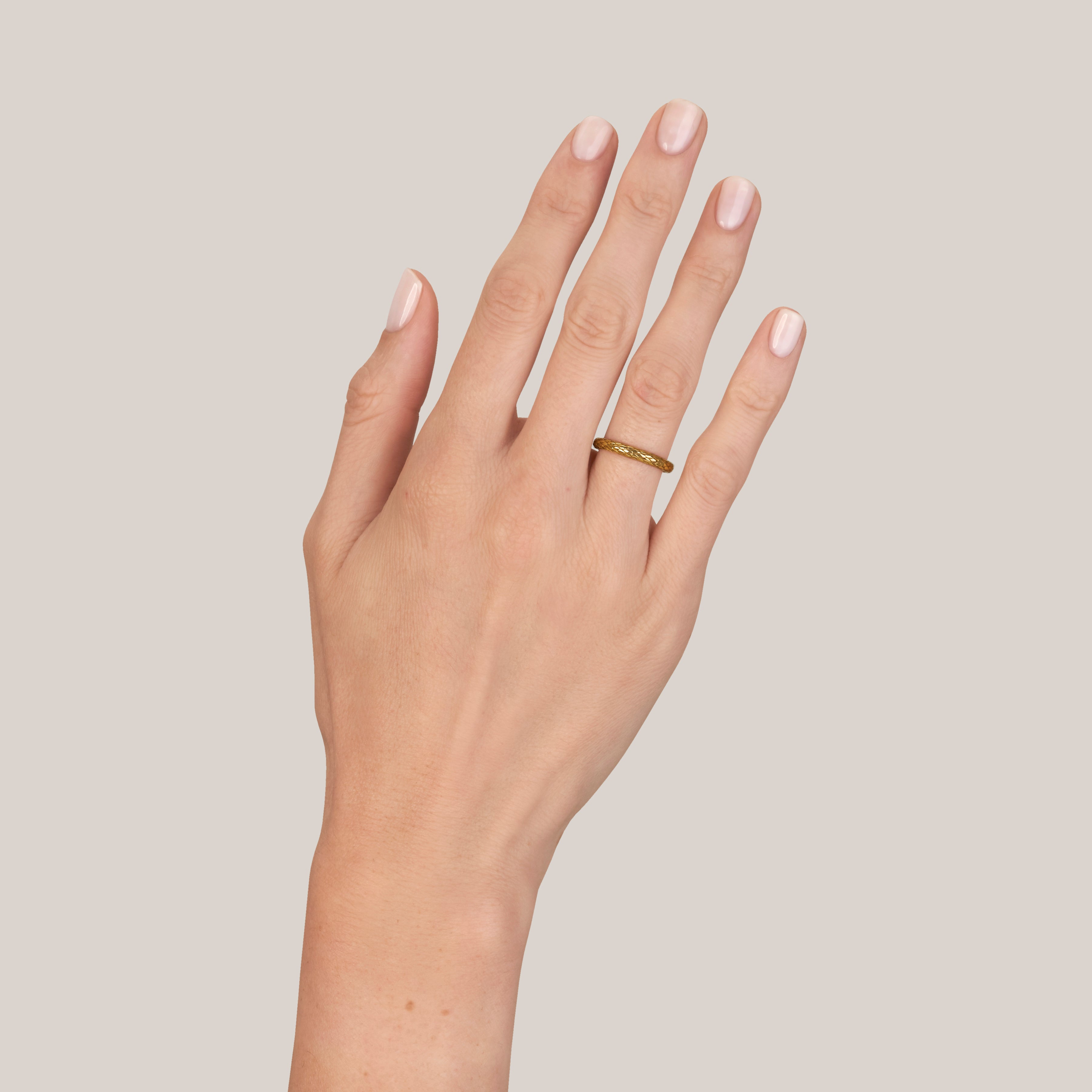 SINGLE STONE SMALL EDEN BAND | 2.5mm handcrafted 18K oxidized yellow gold ladies' snake scale pattern band. Please inquire for additional customization.