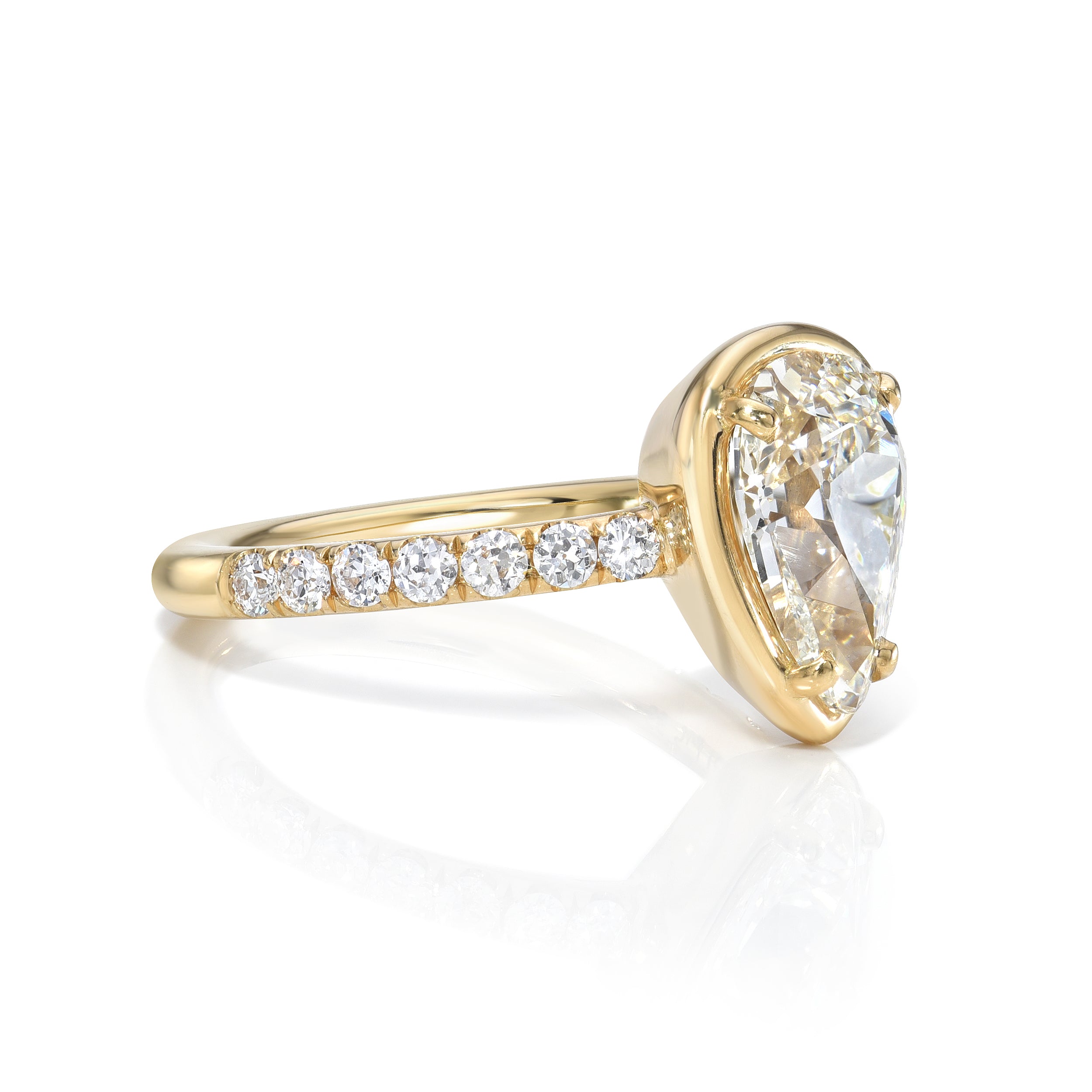 SINGLE STONE ELLA RING featuring 2.13ct H/SI1 GIA certified pear shaped diamond with 0.36ctw old European cut accent diamonds prong set in a handcrafted 18K yellow gold mounting.