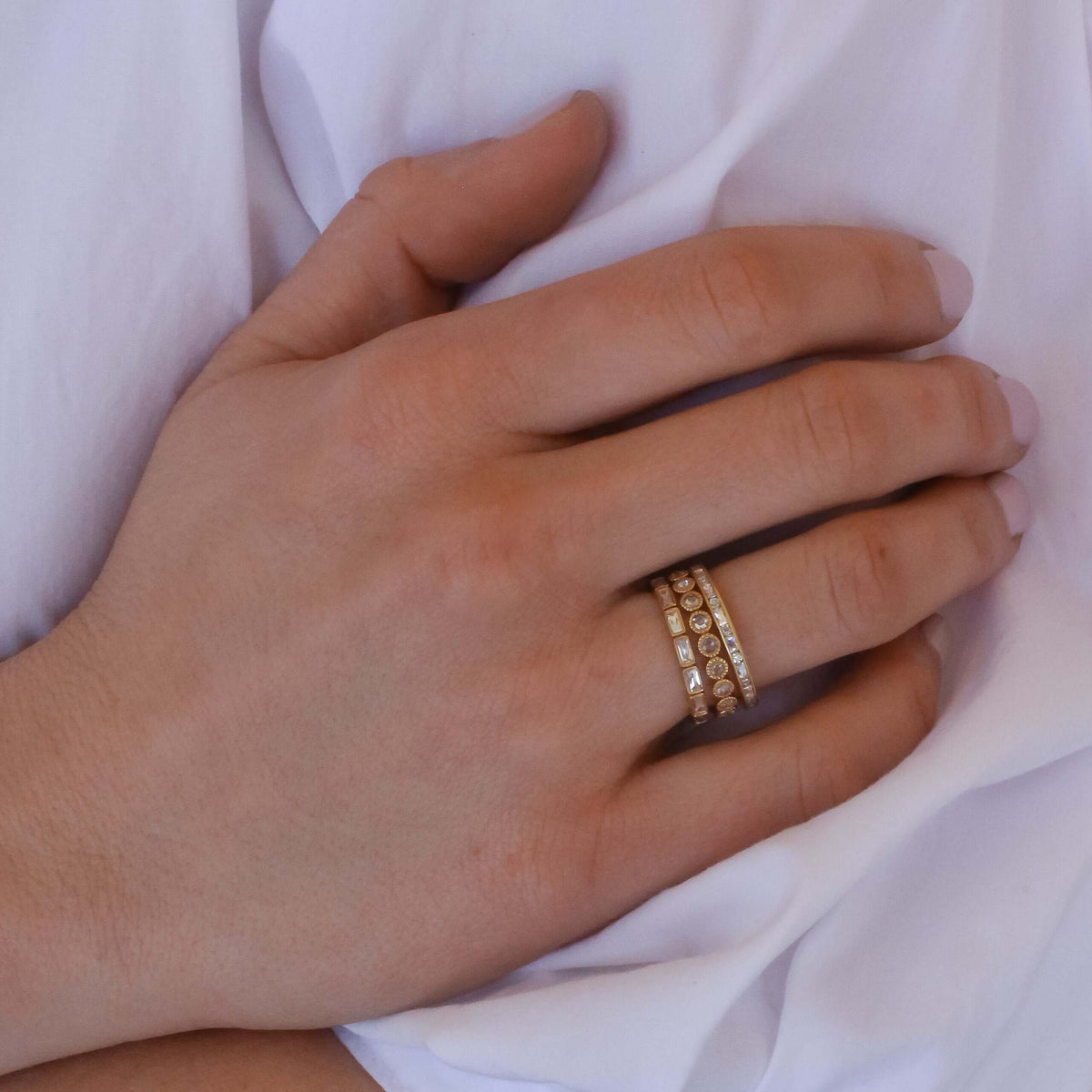 SINGLE STONE MICHELLE BAND | Approximately 0.65ctw French cut and old European cut diamonds set in a handcrafted channel set eternity band. Approximate band width 2.1mm. All of our jewelry is individually made to order in Los Angeles, please allow 6-8 we