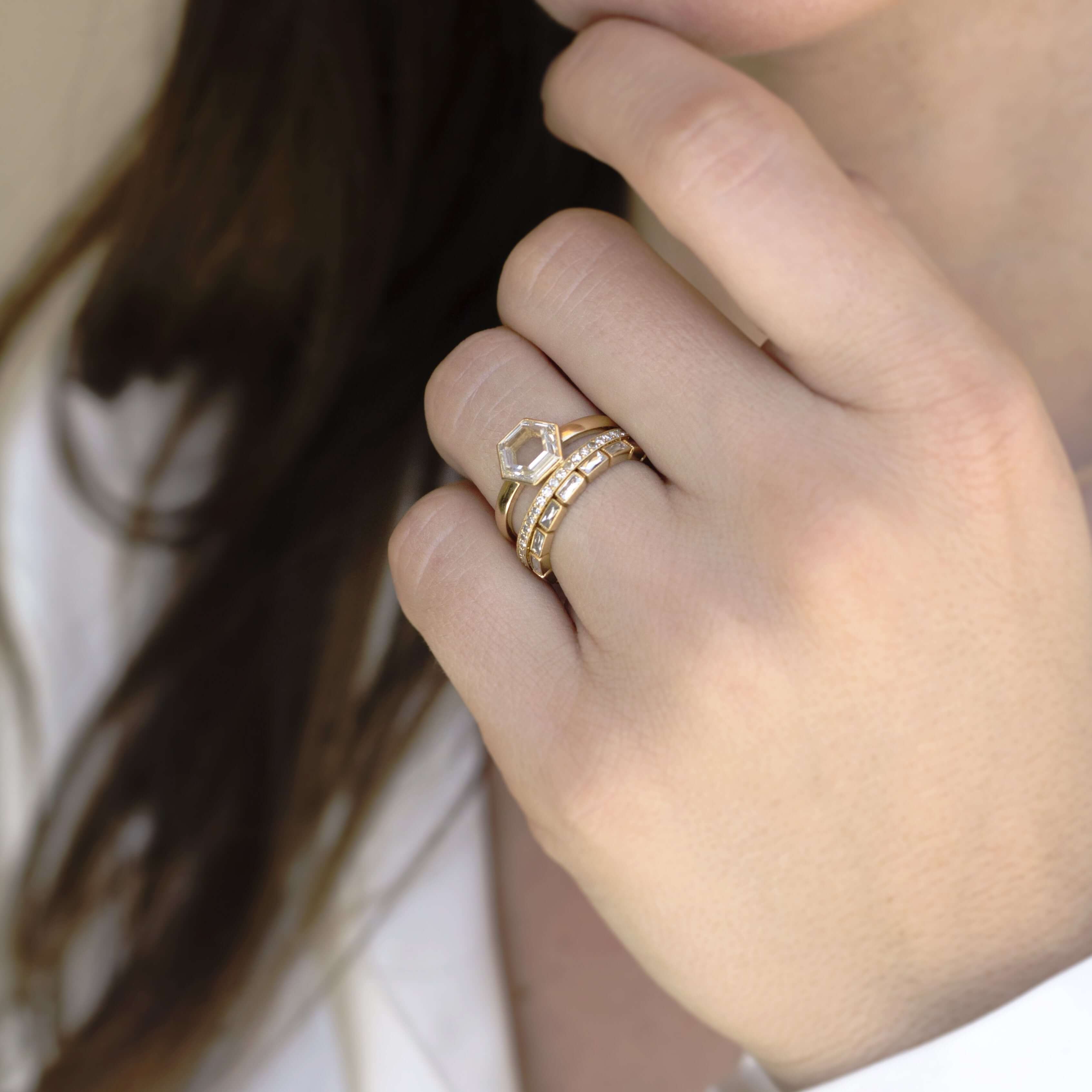 SINGLE STONE SMALL JULIA BAND | Approximately 0.75ctw G-H/VS French cut diamonds bezel set in a handcrafted eternity band. Approximate band with 2.1mm. Please inquire for additional customization.