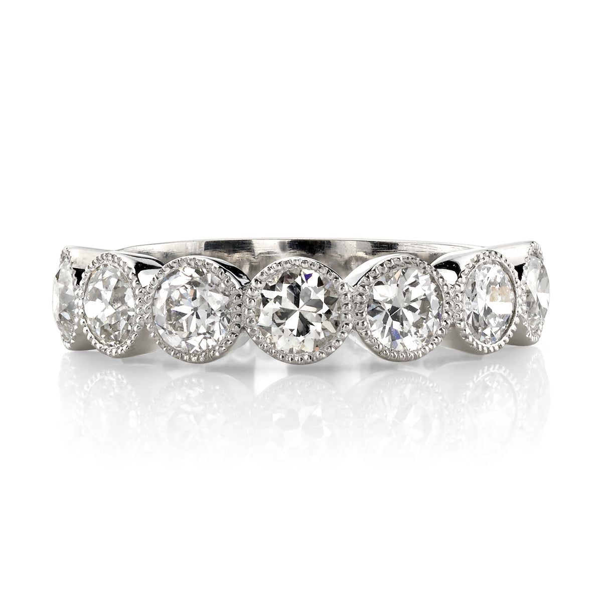 SINGLE STONE LARGE GABBY HALF BAND BAND | Approximately 1.50-1.70ctw old European cut diamonds set in a handcrafted bezel set half-eternity band. Approximate band width 4.8mm.