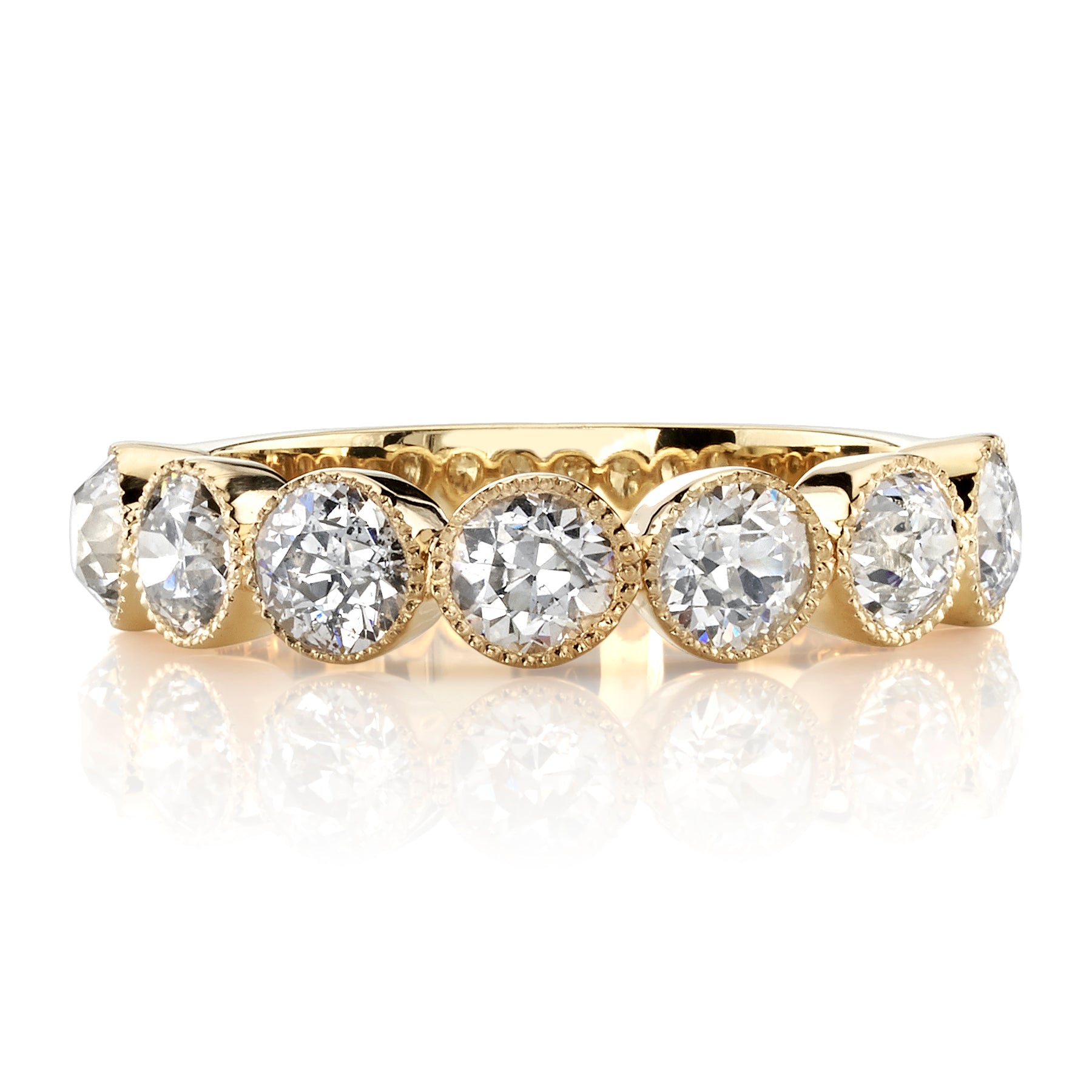 SINGLE STONE LARGE GABBY HALF BAND BAND | Approximately 1.50-1.70ctw old European cut diamonds set in a handcrafted bezel set half-eternity band. Approximate band width 4.8mm.