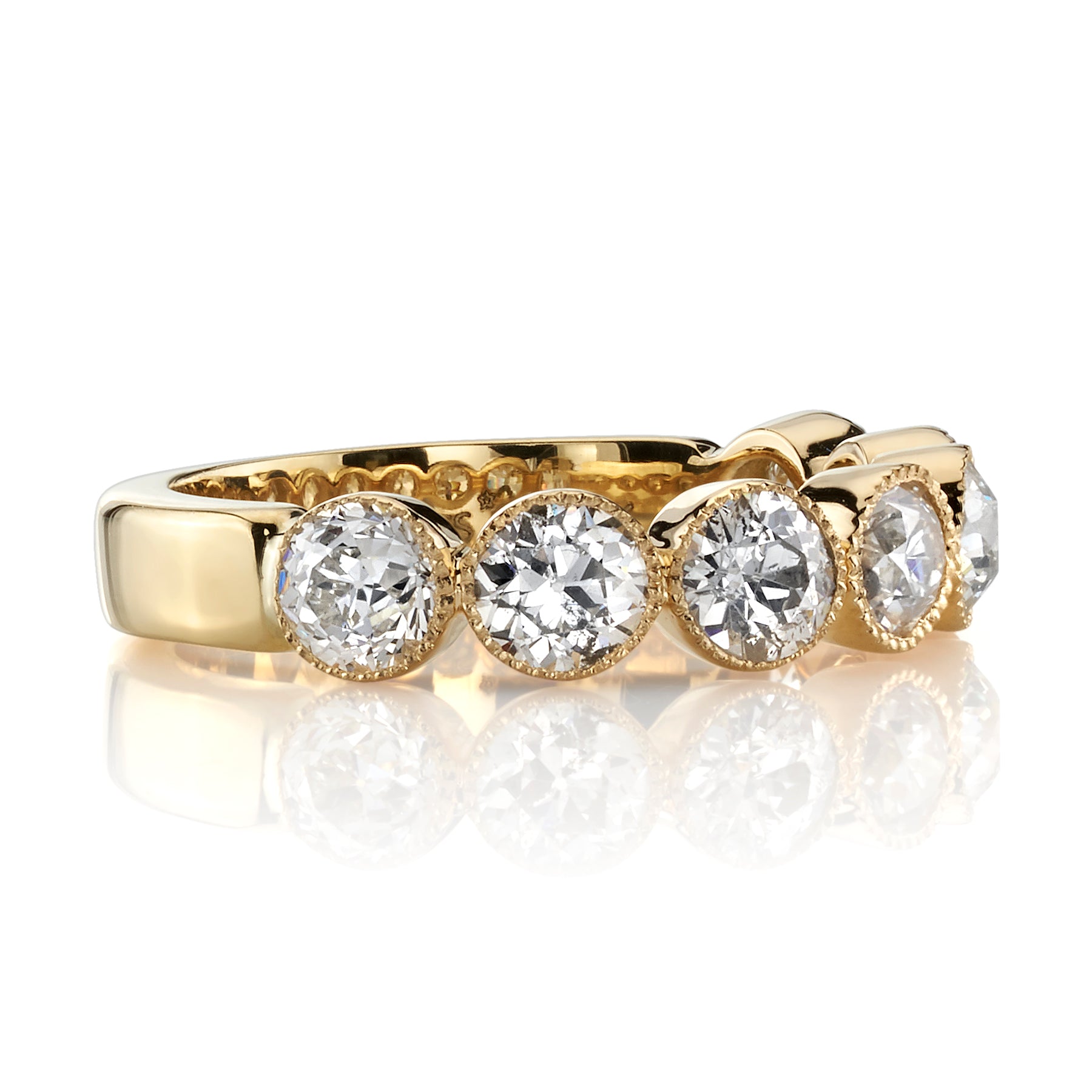 SINGLE STONE LARGE GABBY HALF BAND BAND | Approximately 1.50-1.70ctw old European cut diamonds set in a handcrafted bezel set half-eternity band. Approximate band width 4.8mm.