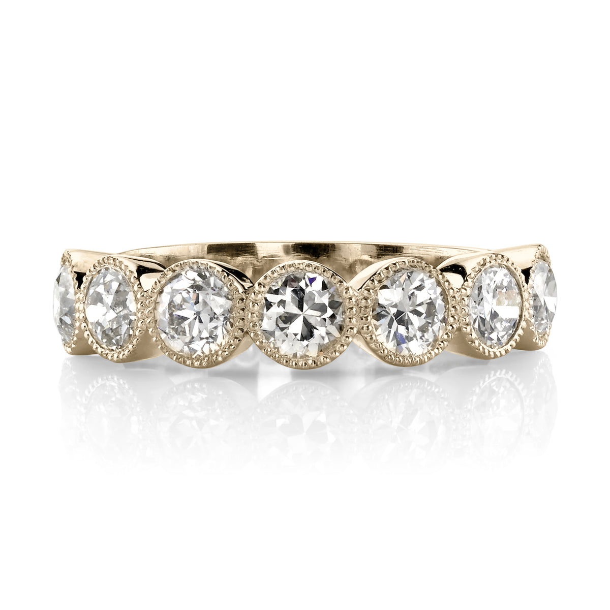 SINGLE STONE LARGE GABBY HALF BAND BAND | Approximately 1.50-1.70ctw old European cut diamonds set in a handcrafted bezel set half-eternity band. Approximate band width 4.8mm.
