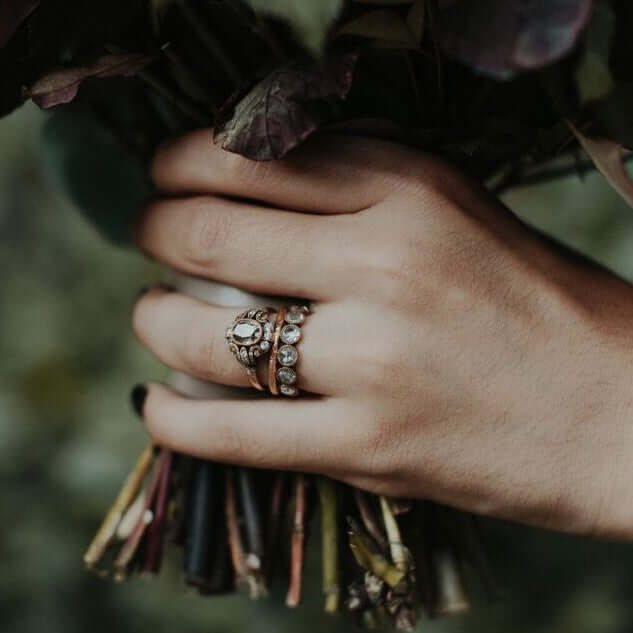 SINGLE STONE SMALL JANE BAND | 1.5mm handcrafted hammer finished gold band. Please inquire for additional customization.