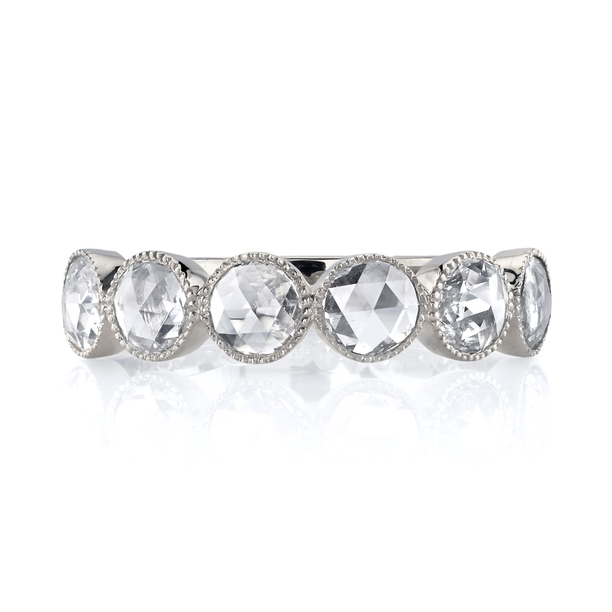 SINGLE STONE LARGE ROSE CUT GABBY HALF BAND BAND | Approximately 0.90ctw rose cut diamonds set in a handcrafted bezel set half-eternity band. Approximate band width 4.8mm. Please inquire for additional customization.