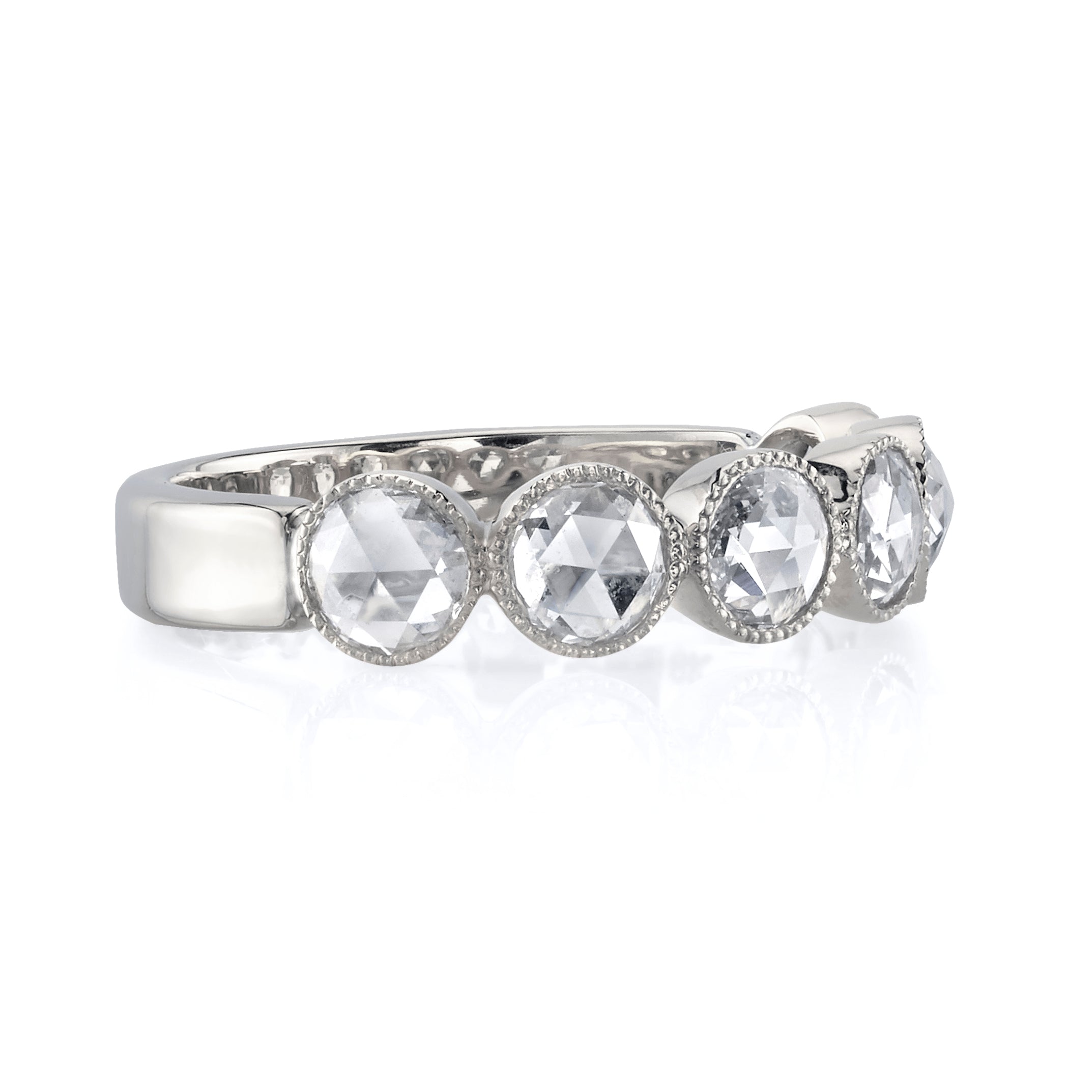 SINGLE STONE LARGE ROSE CUT GABBY HALF BAND BAND | Approximately 0.90ctw rose cut diamonds set in a handcrafted bezel set half-eternity band. Approximate band width 4.8mm. Please inquire for additional customization.
